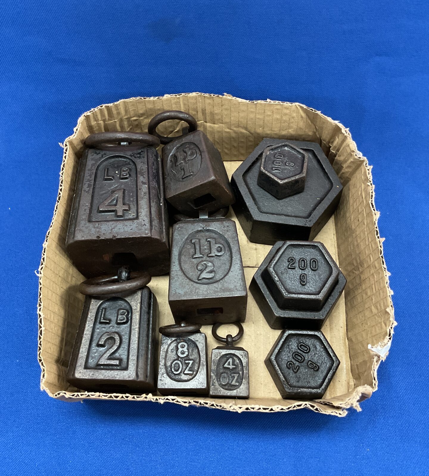 two sets cast iron weights lbs and kilos