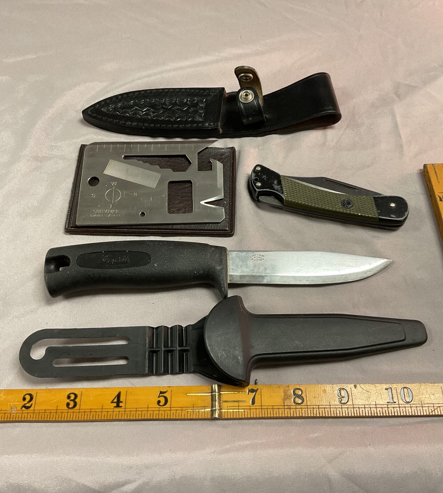 Three assorted knives inc Eric frost and survival knife