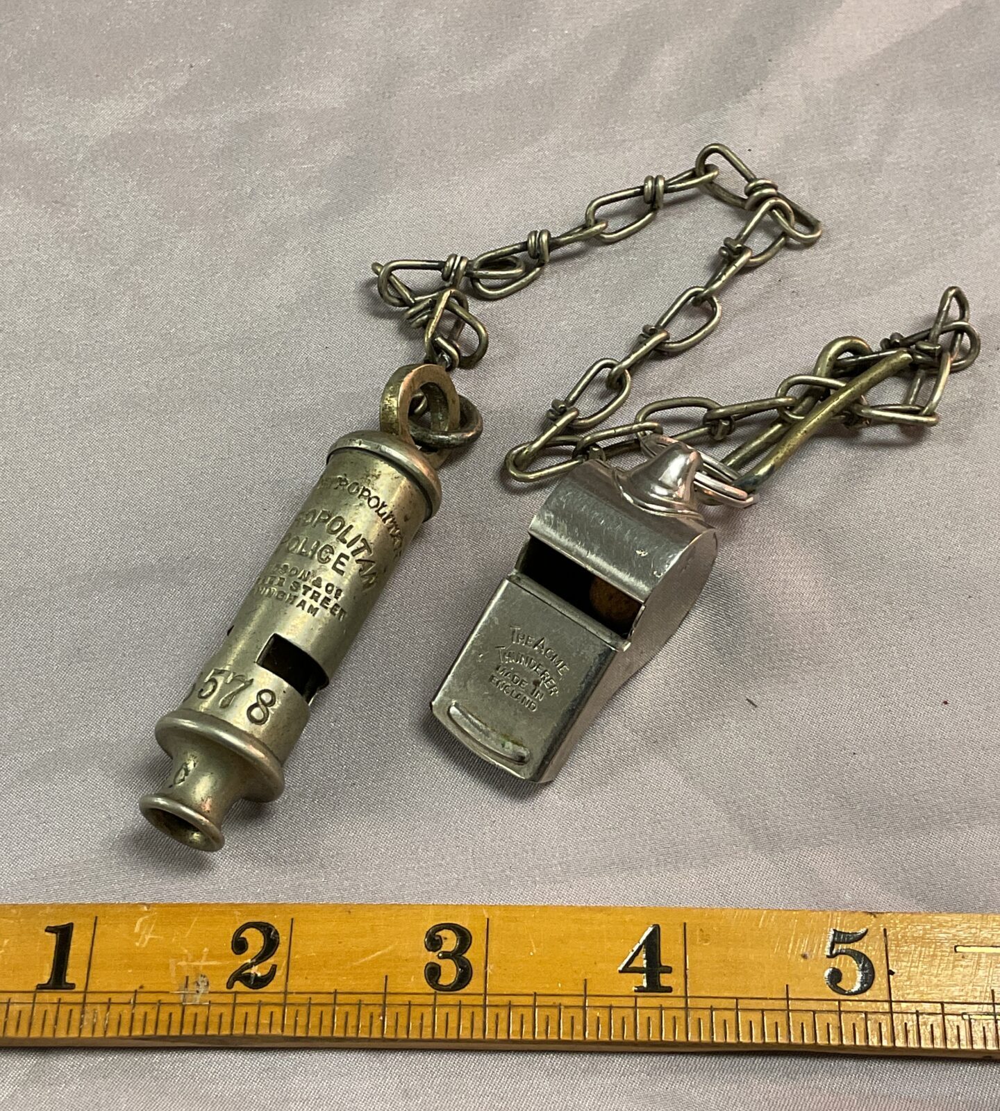 Antique metropolitan police officers whistle and chain inc acme whistle