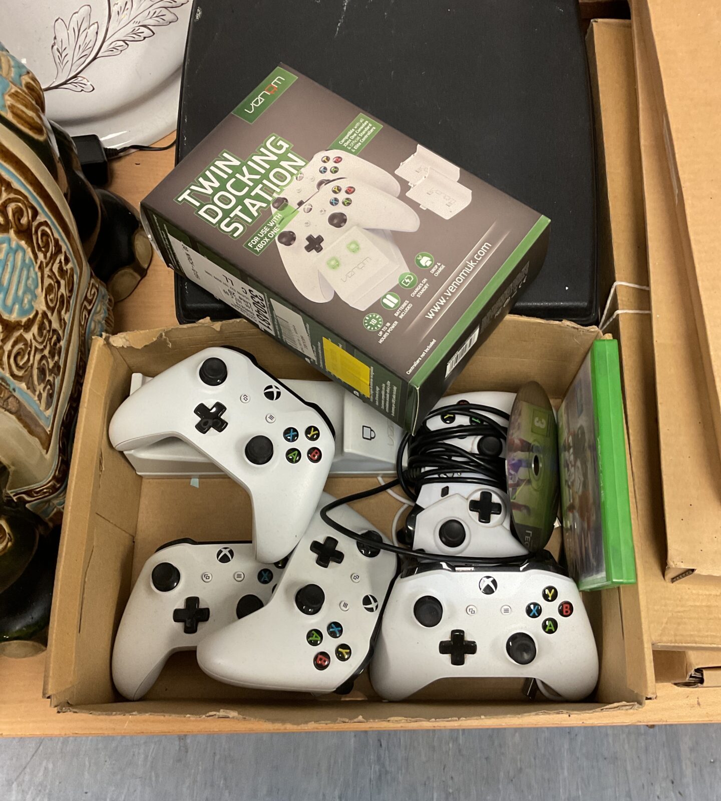 Tray of xbox gaming controllers