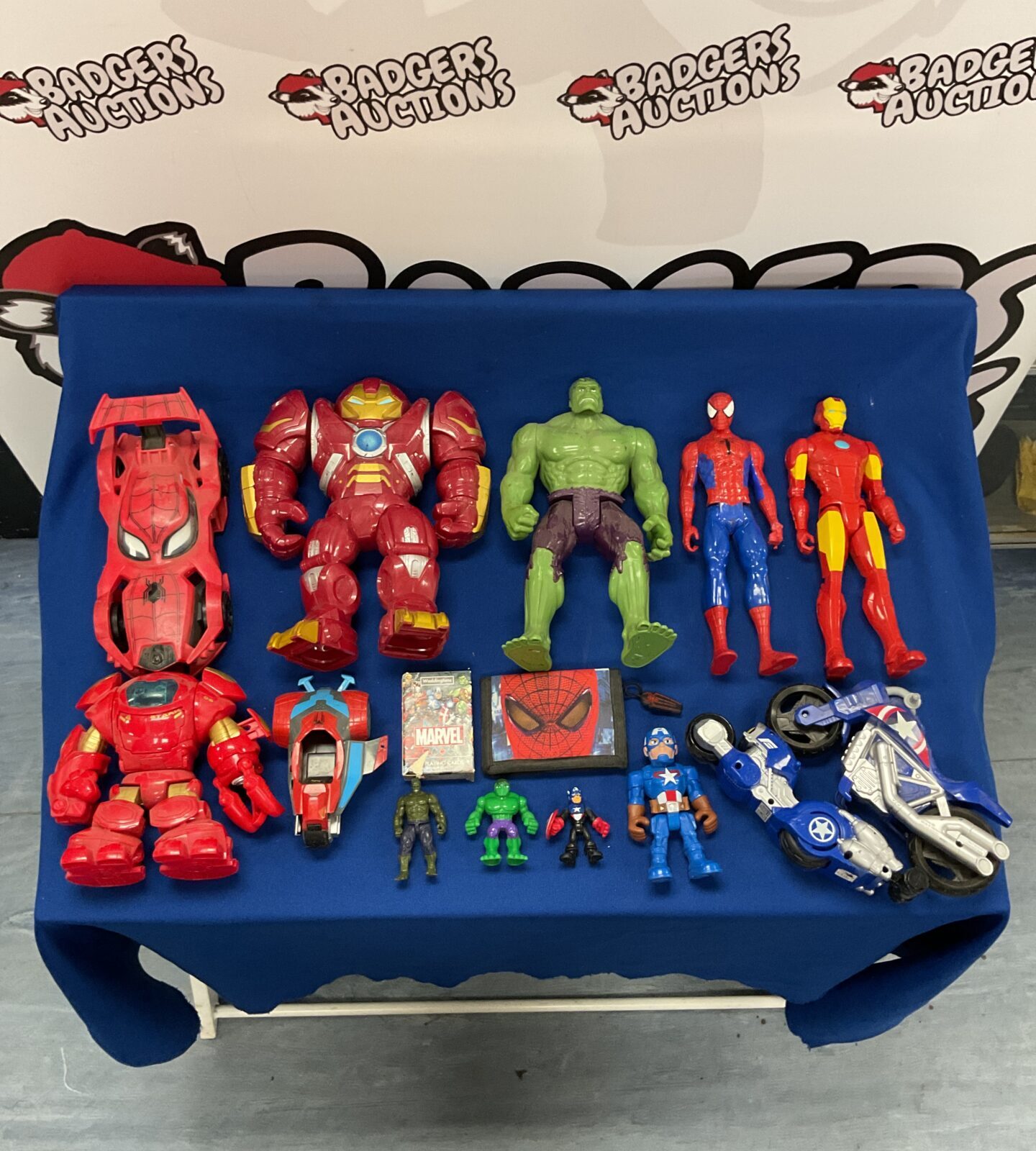 Selection of mixed marvel action figures and vehicles