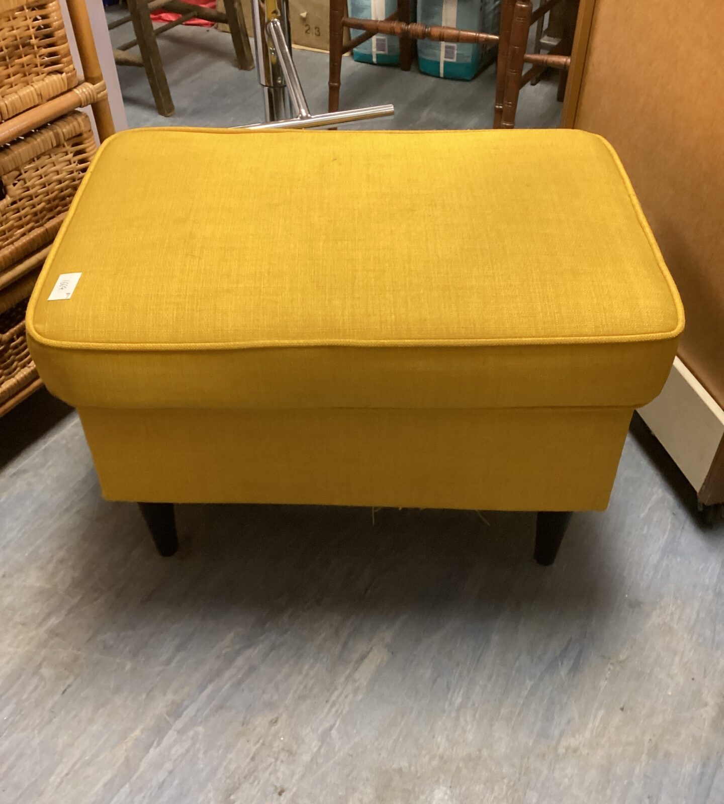 Yellow ikea foot stool