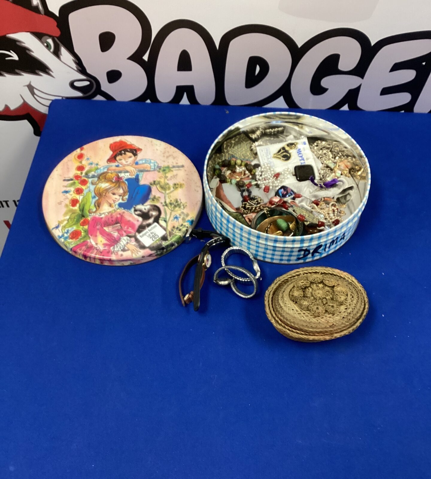 Tin of Costume jewellery and watches