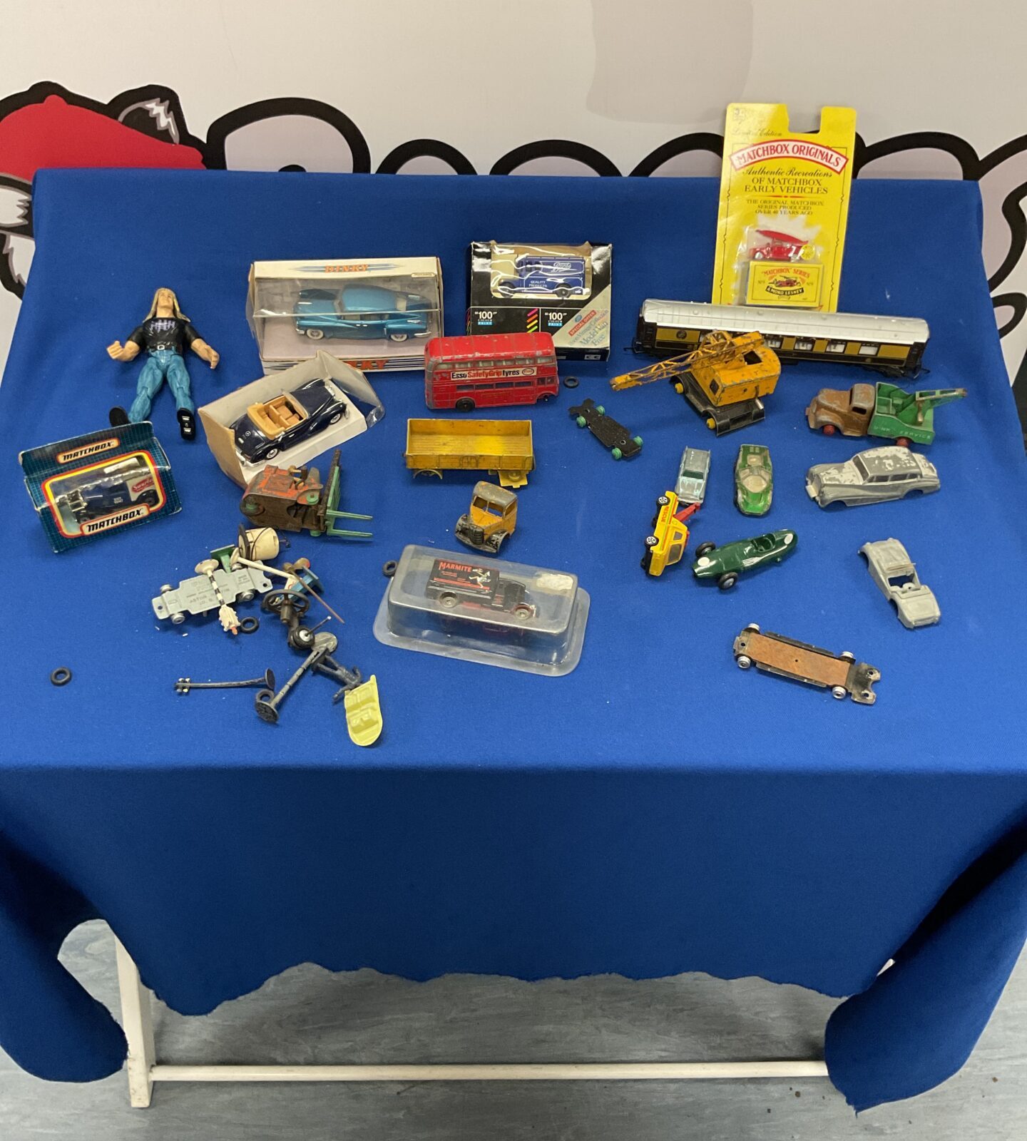 Box of mixed diecast models inc dinky and matchbox. Also inc wwe figure and diecast accessories