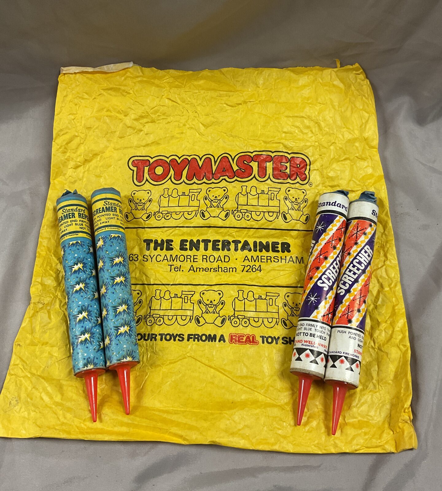 Four vintage standard fireworks two screamers and two screechers