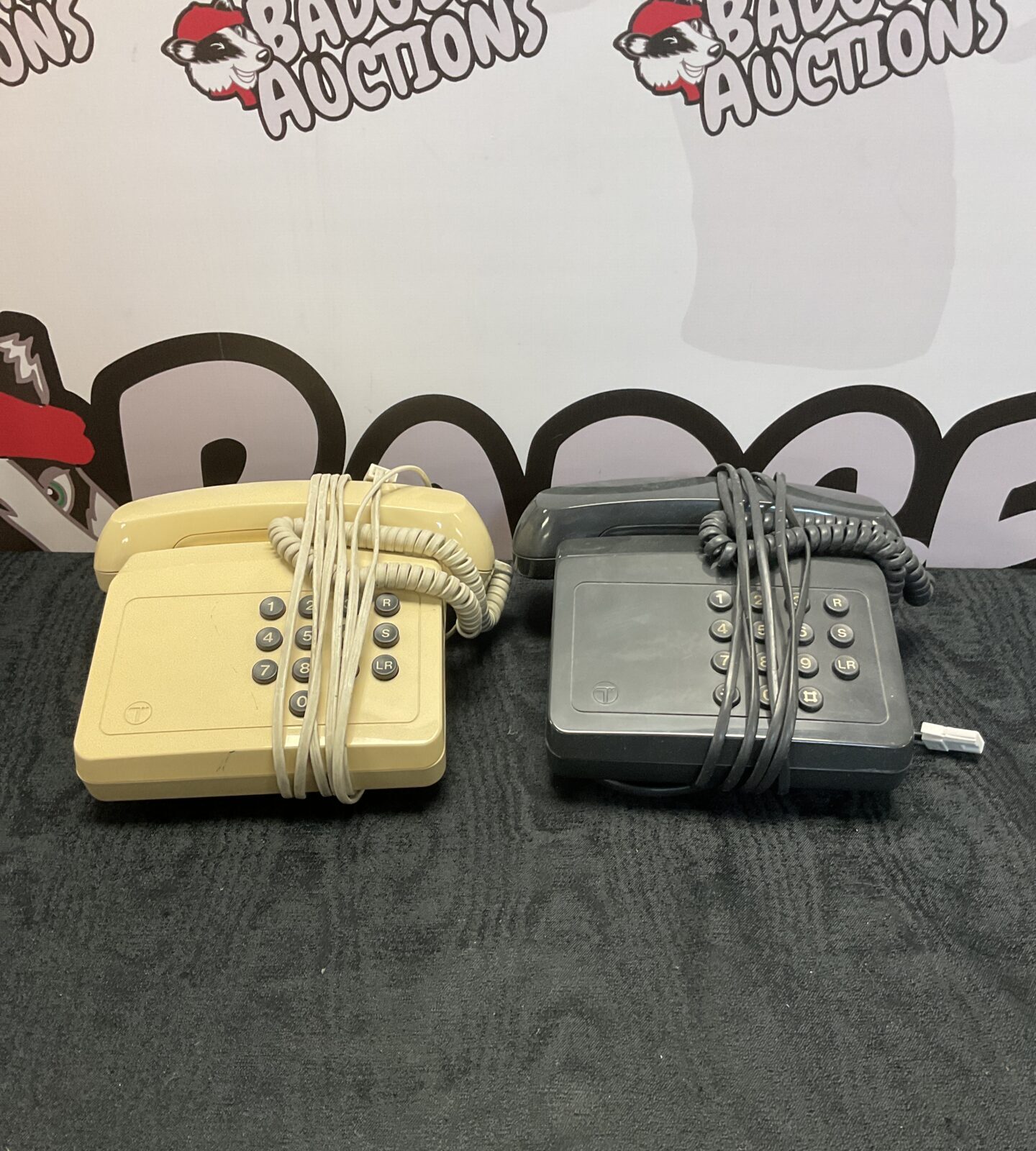 Two retro British telecom push button telephones