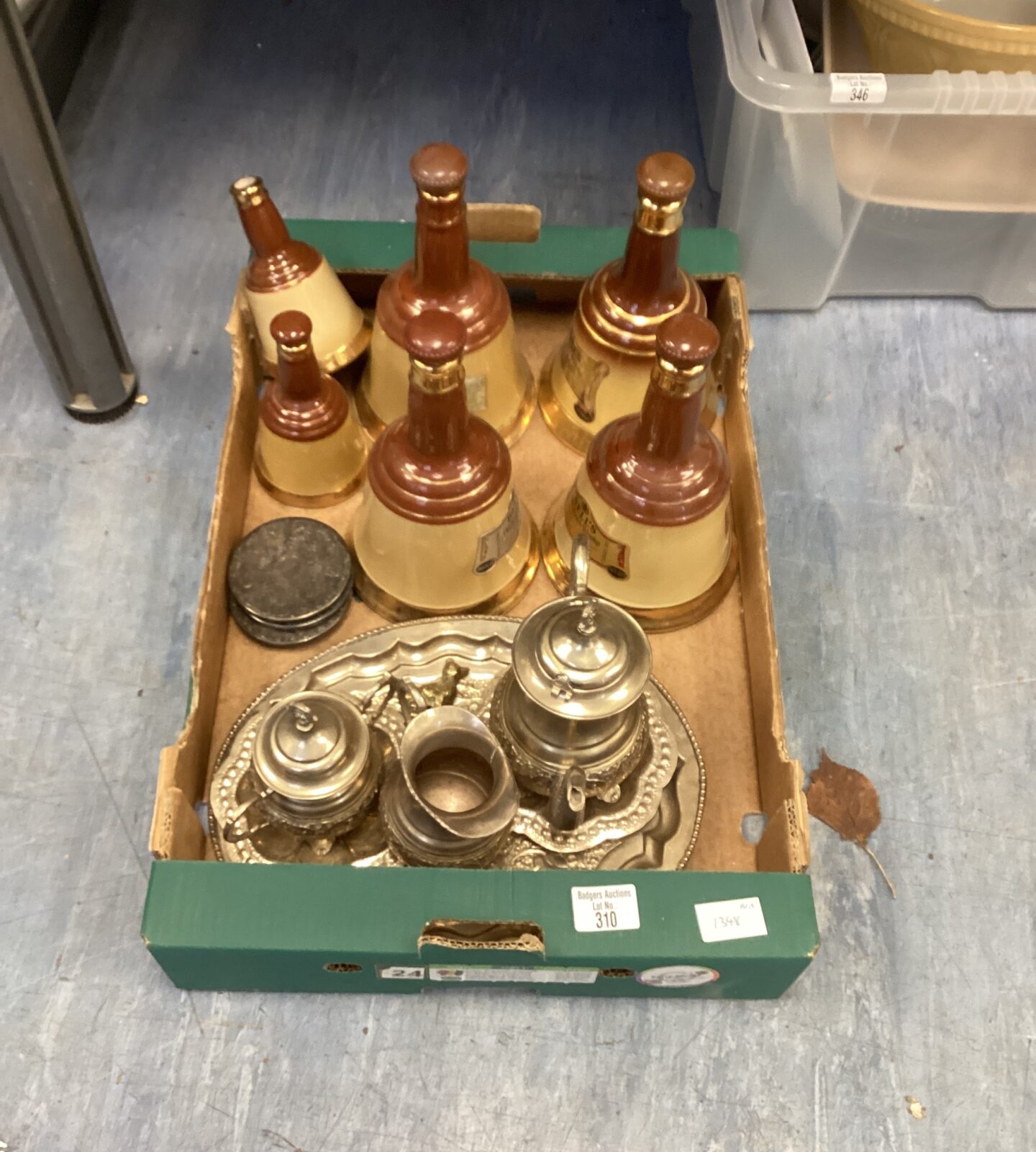 Box of empty Bells pottery Bottles and silverplate coffee set