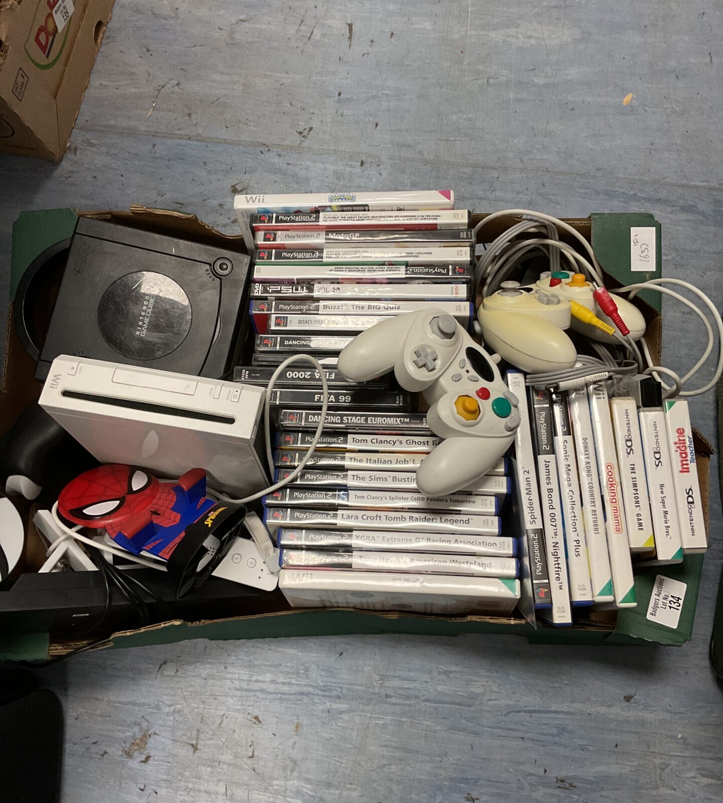 Tray of mixed games including nintendo gamecube console