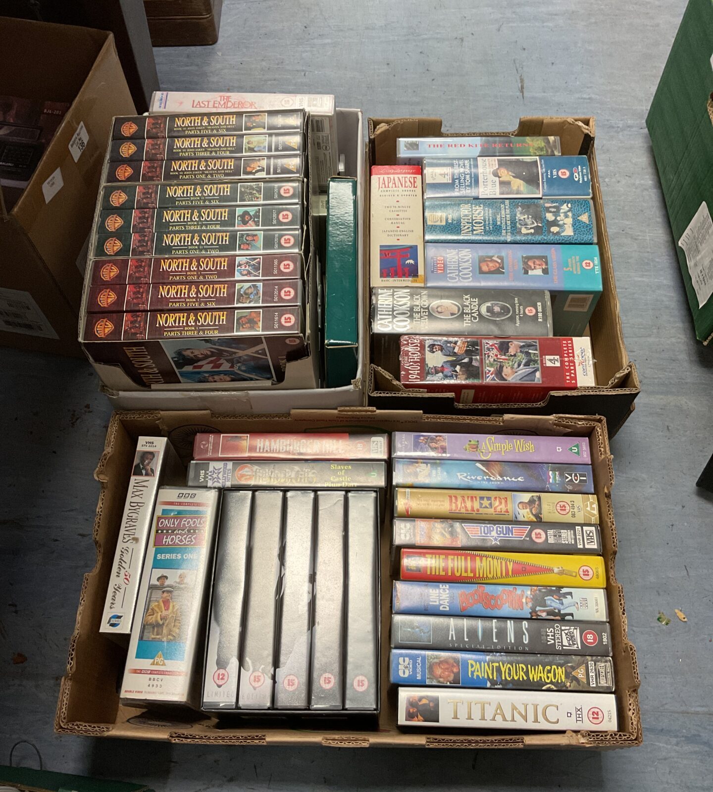 Collection of vhs cassette tapes including north & south boxset