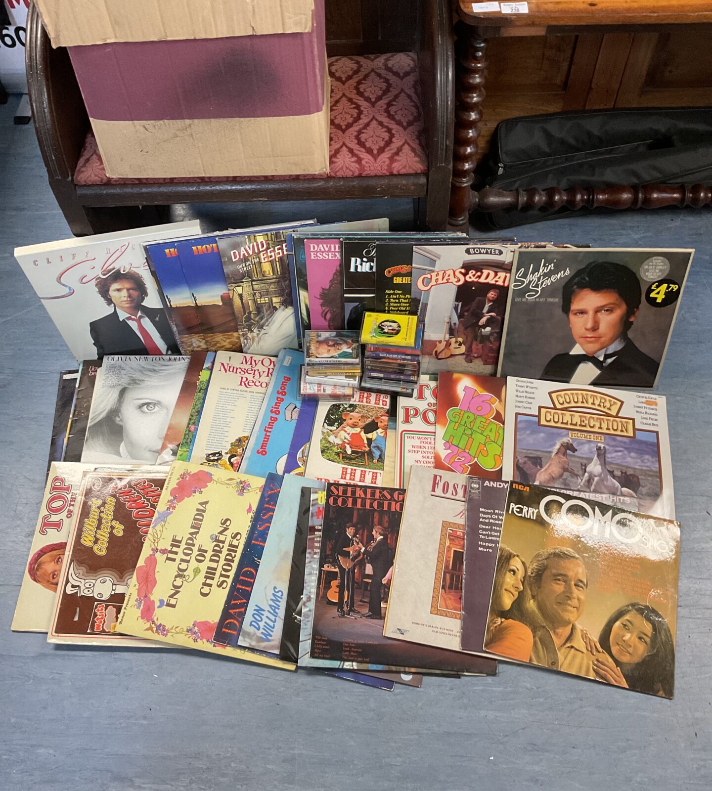 Collection of 12” vinyl records & cassette tapes