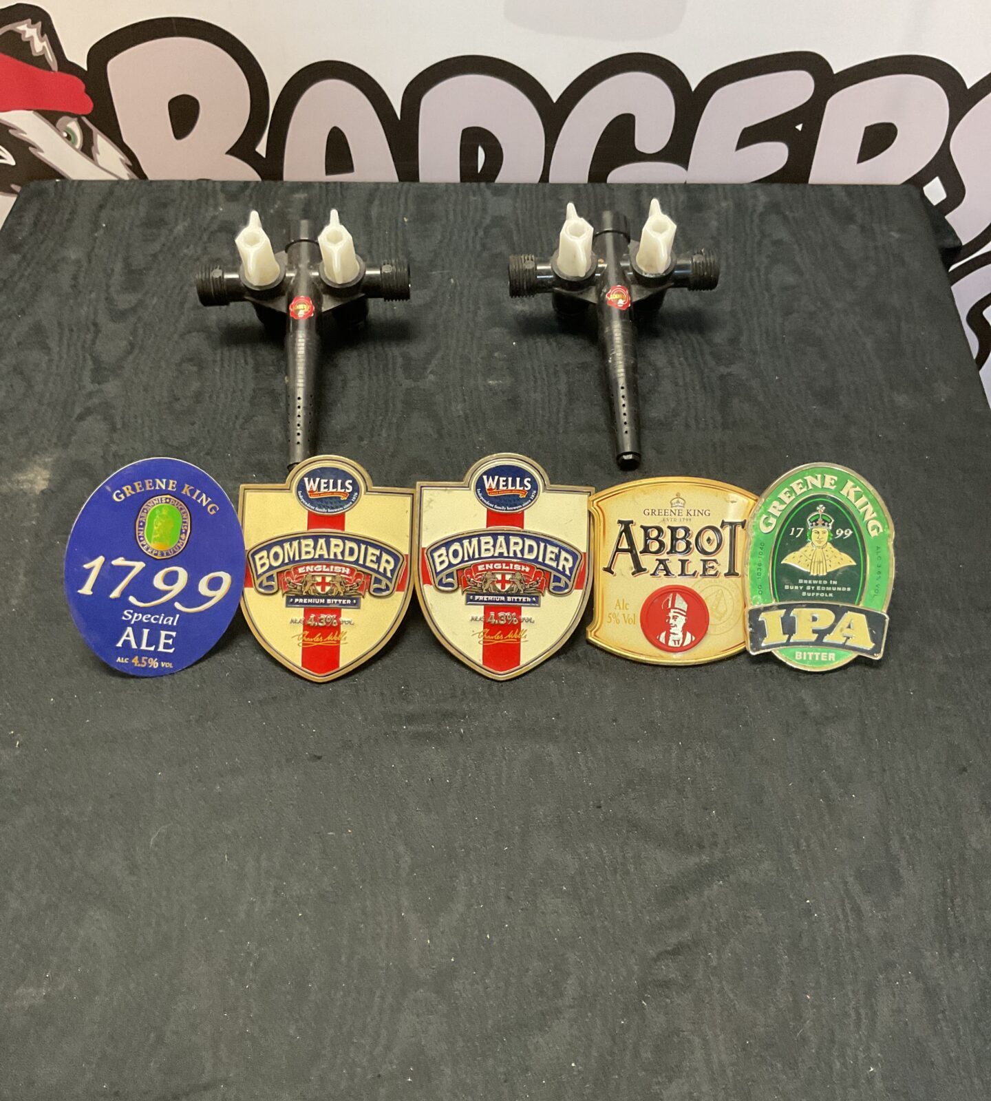 Tray of beer pump signs inc bombardier