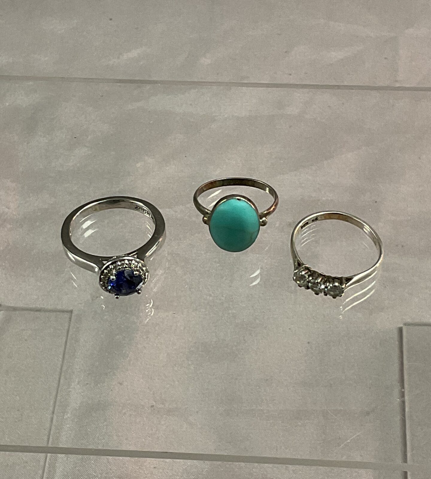 Three 925 Silver stone set rings sizes L M P