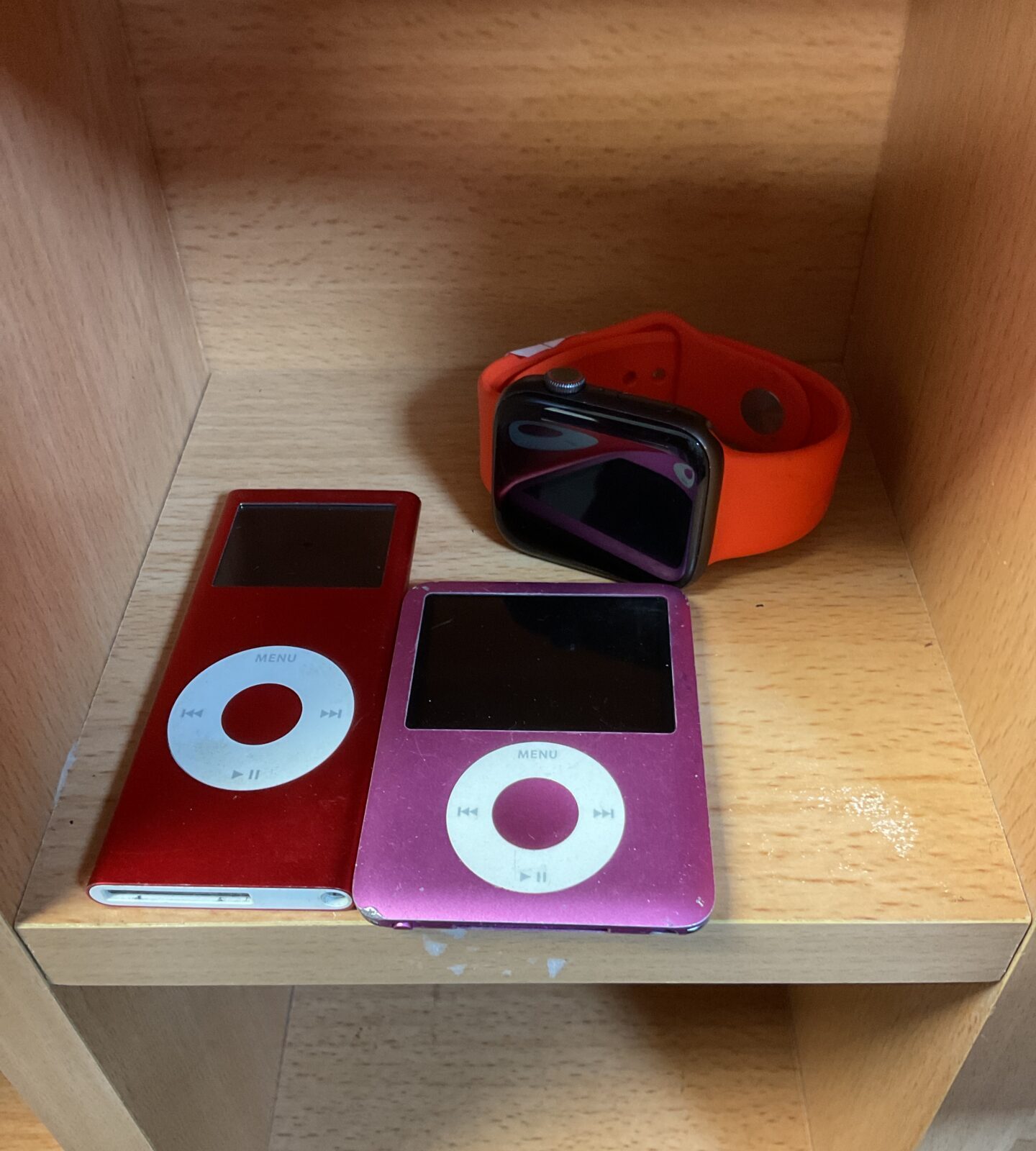 Two apple ipods & apple watch