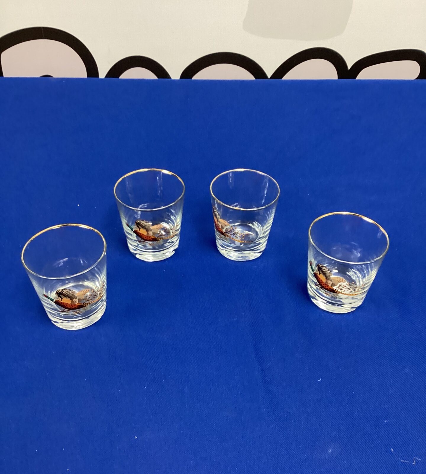 Four pheasant decorated Tumblers