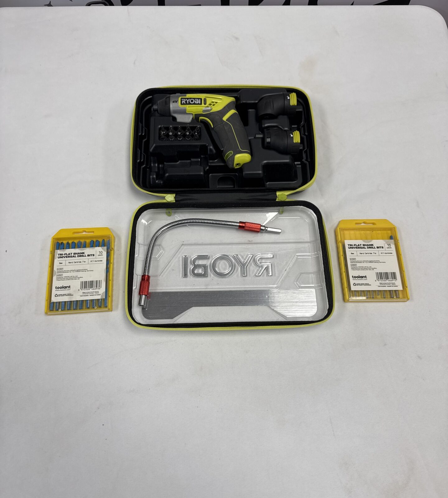 Ryobi cordless screwdriver set with two packs of drill bits - working