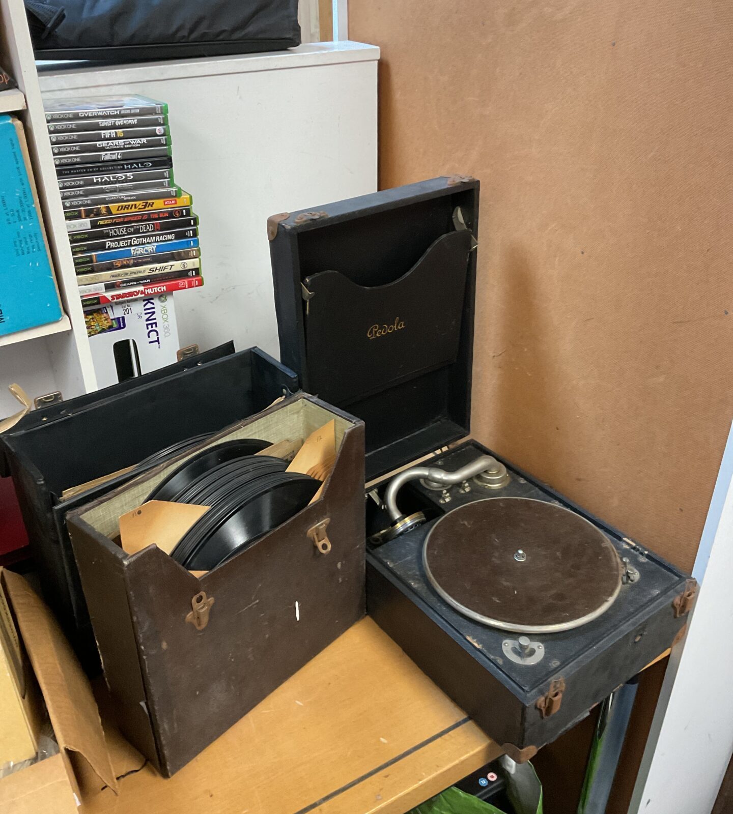 Vintage pedola gramophone with two cases of records