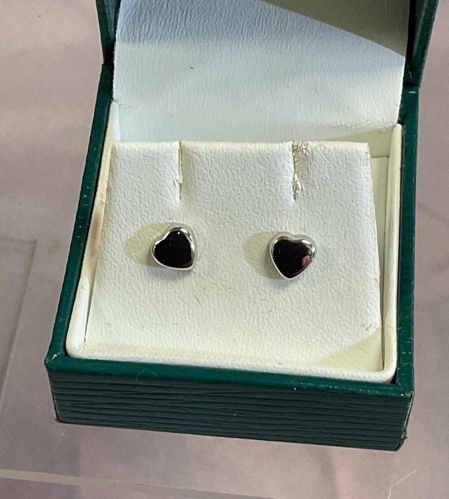 Pair of 9ct white gold heart stud earrings