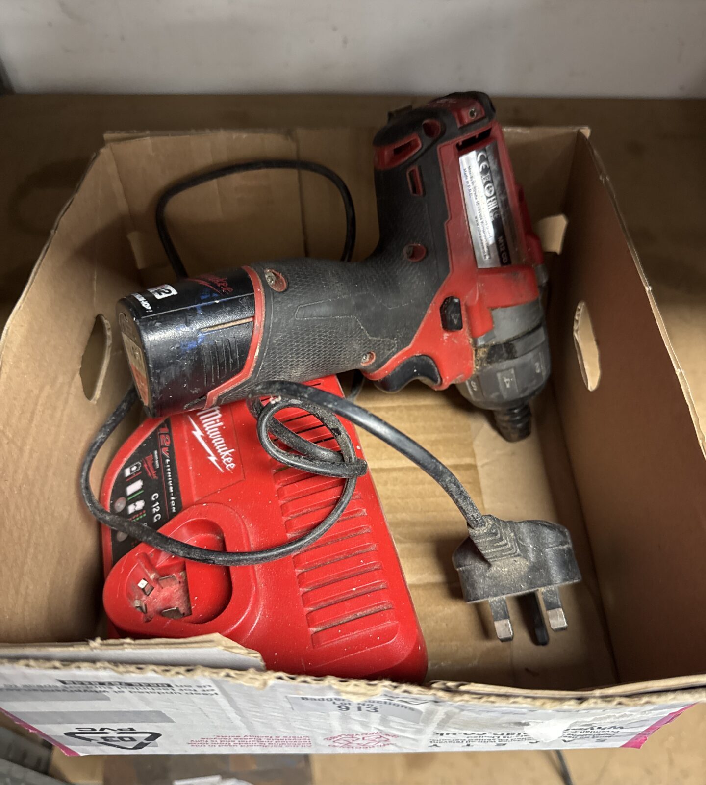 Milwaukee m12 cd cordless screwdriver with charger & battery - powers on untested further