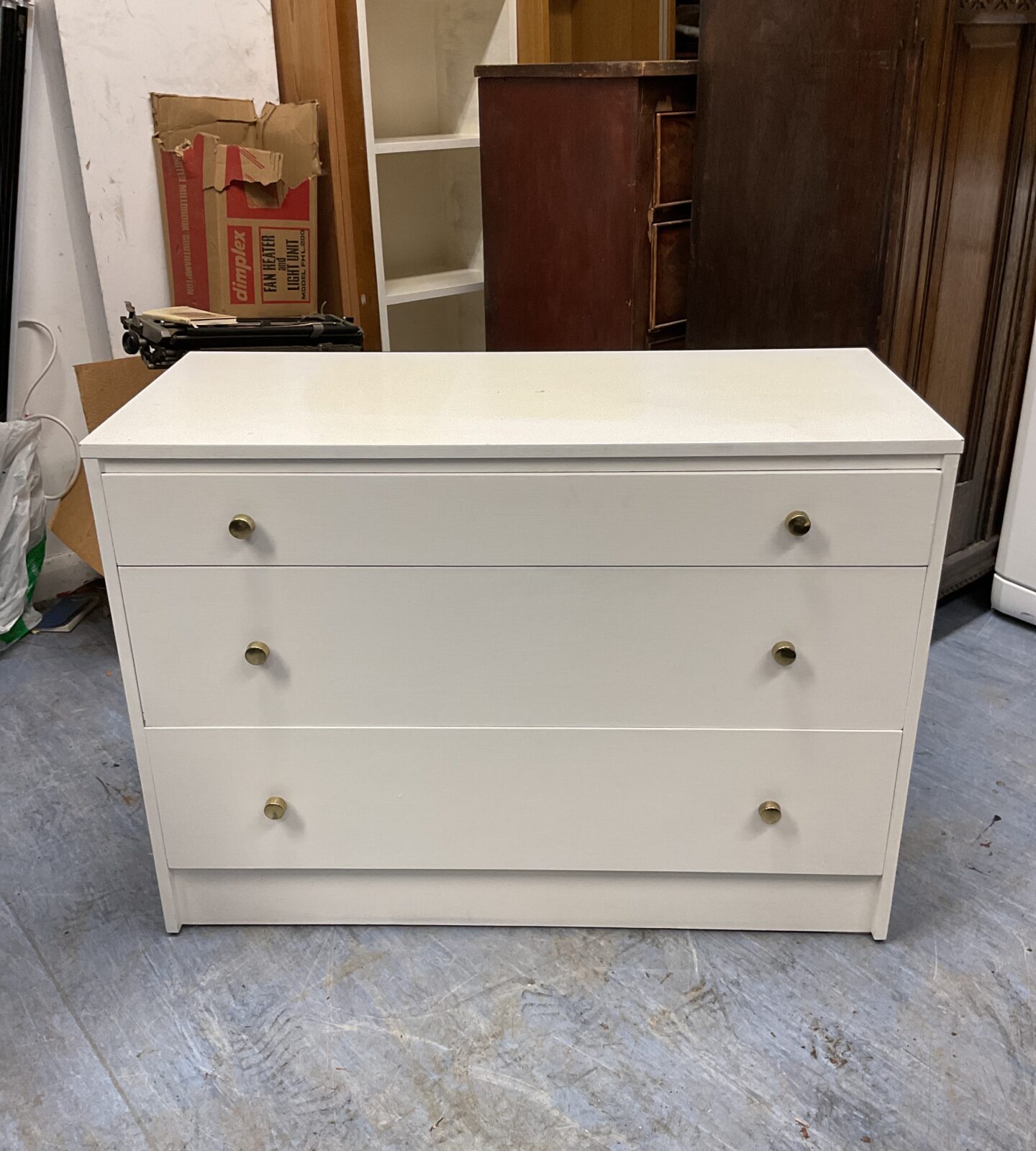 White chest of bedroom drawers made by ercol carpenter