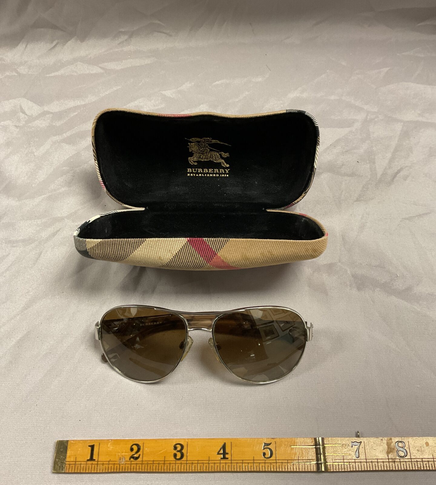 Pair of Burberry sun glasses in case