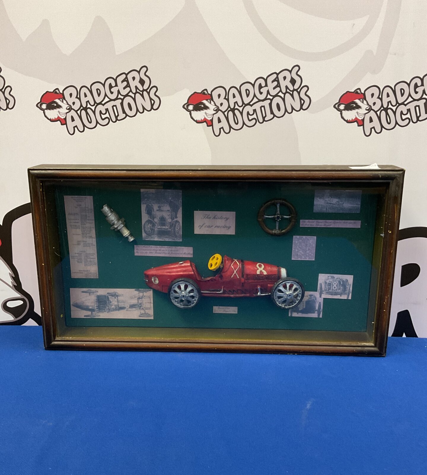 The history of car racing framed diorama