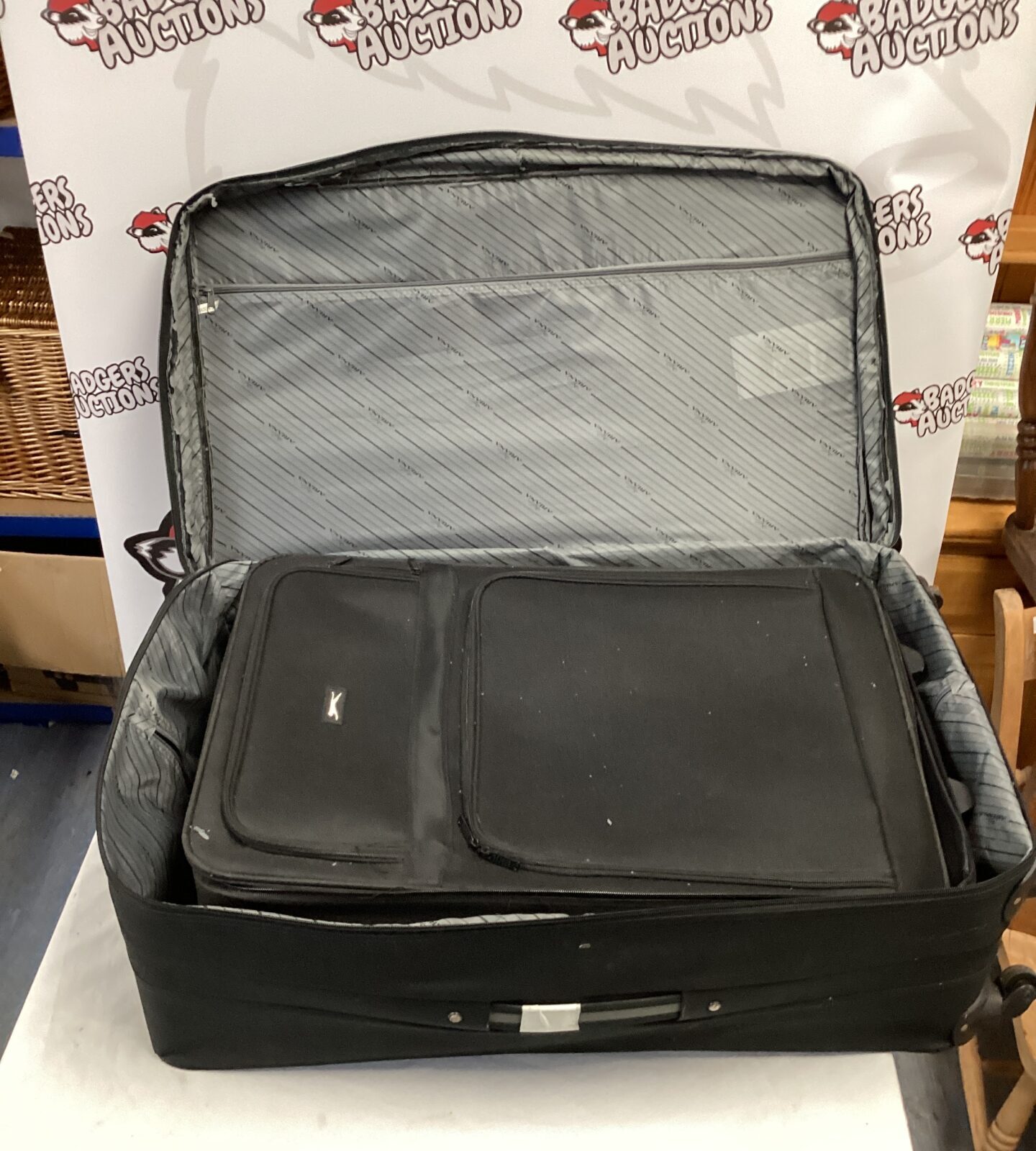 Two suitcases with wheels inc Slazenger & ariana