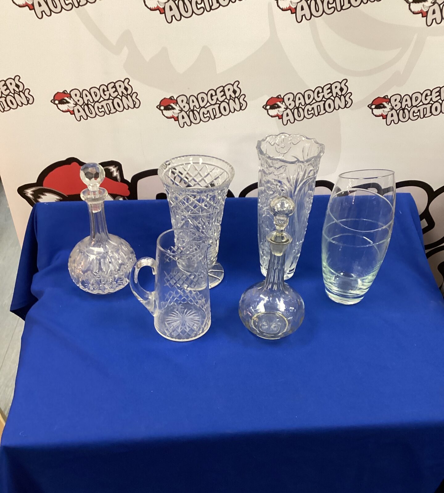 Selection of crystal vases and decanters