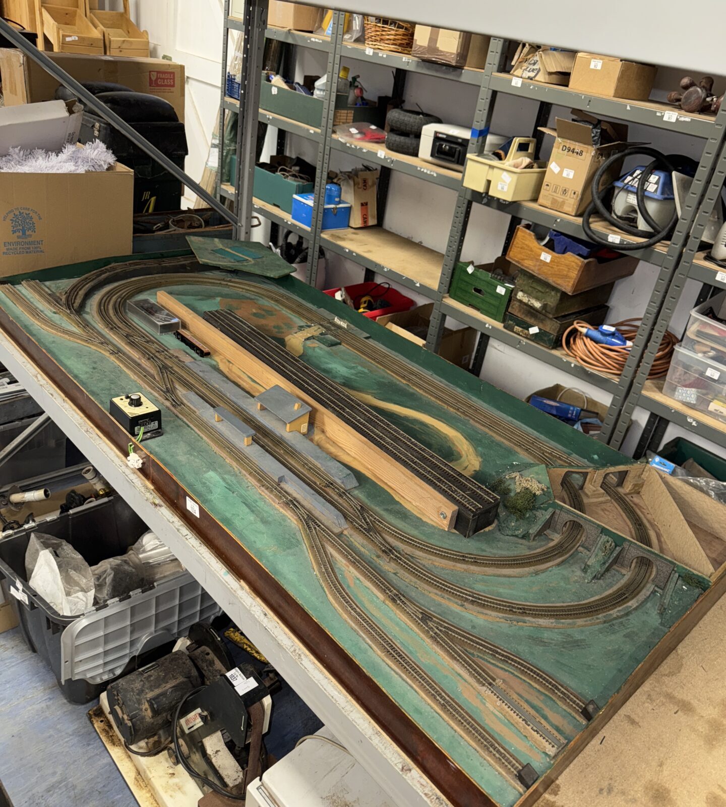 Large section of N gauge model railway with train & carriage