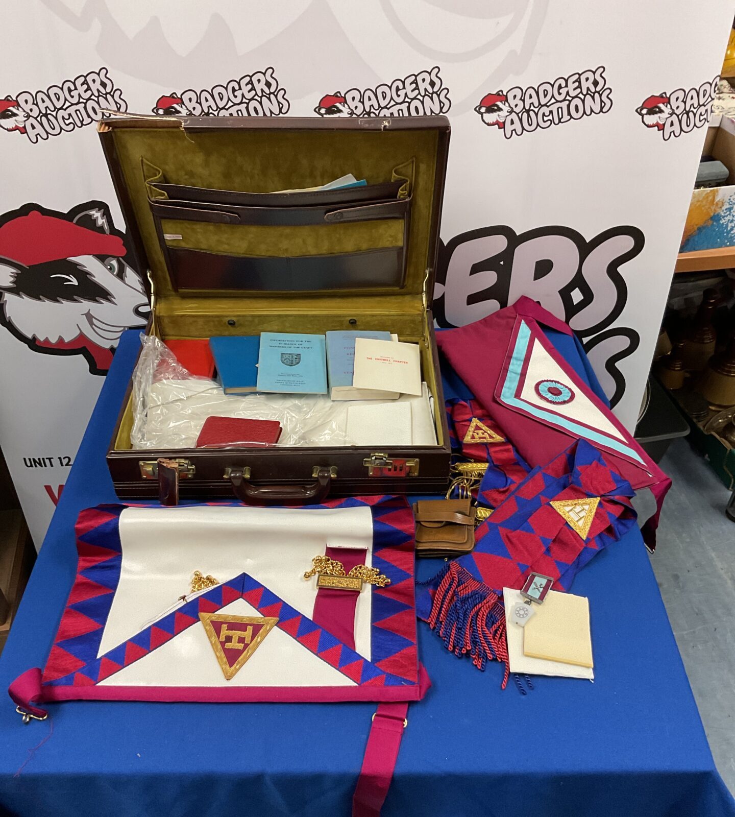 Case of masonic aprons, books & sashes