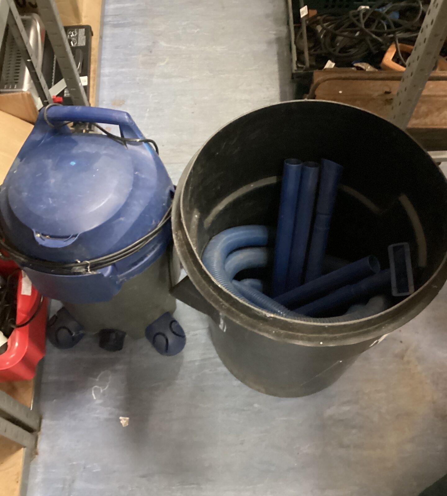 big fish pond pump with bin full of accessories working