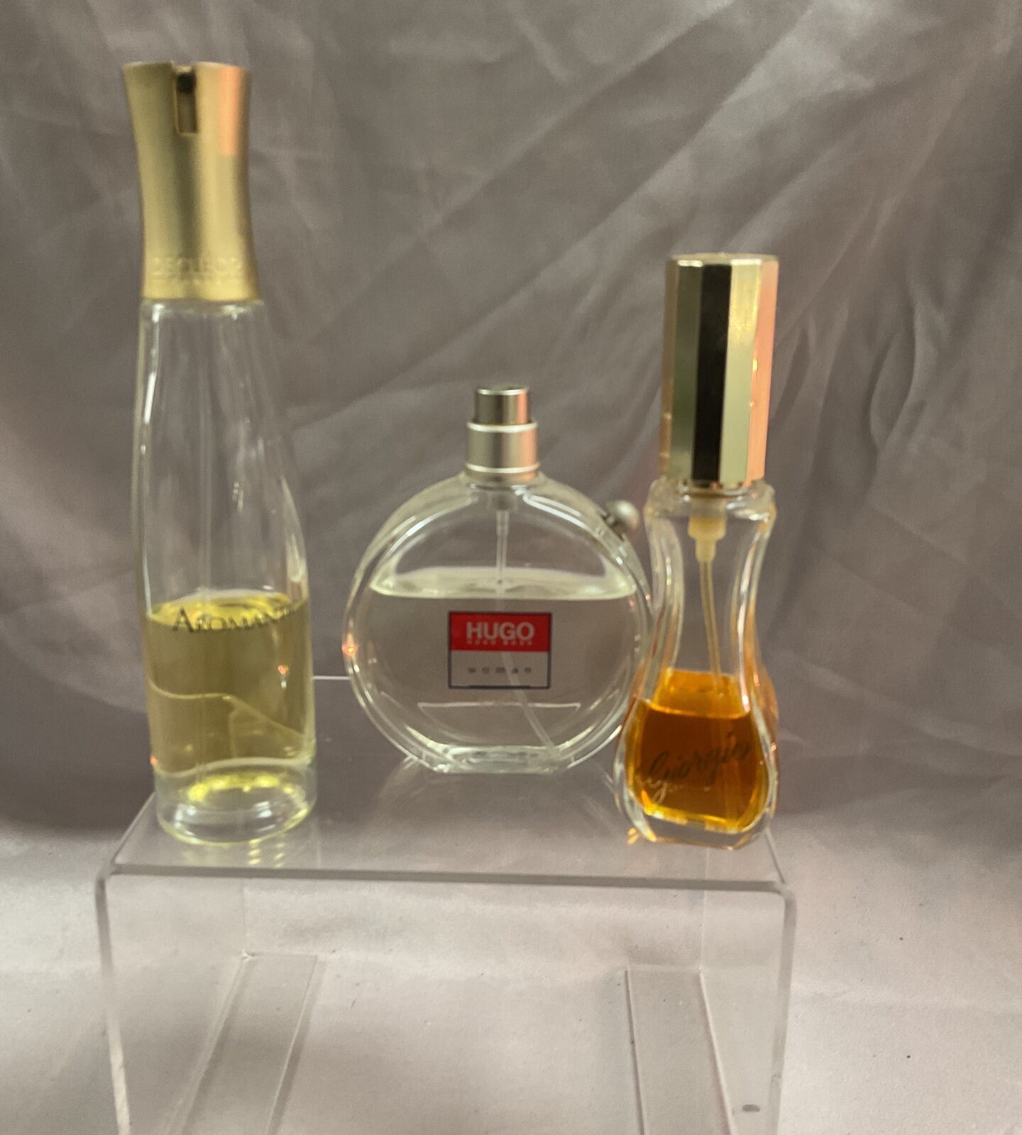 Thre part used bottles perfume Aromatic Hugo and giogio