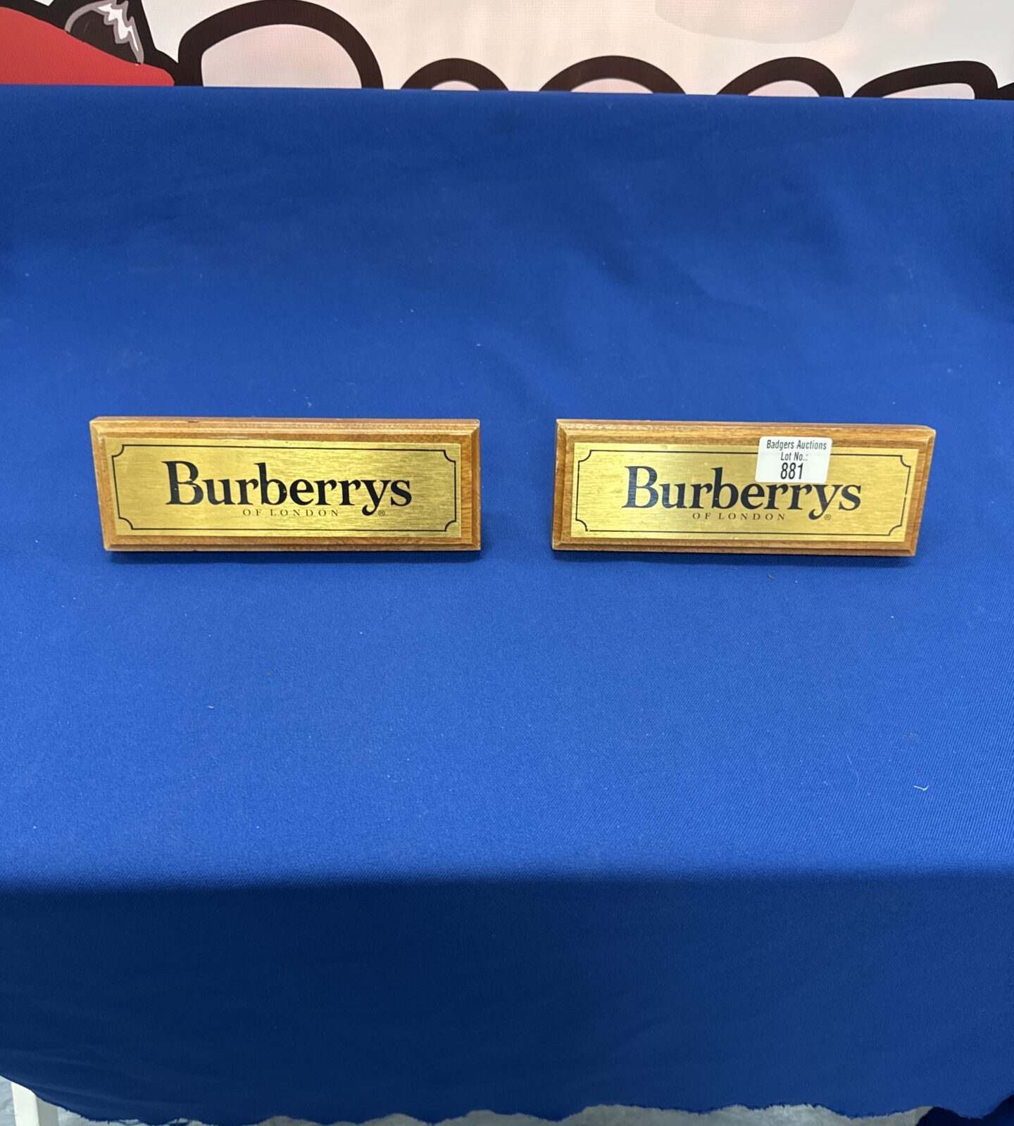 Two burberrys of London exhibition plaques 8.25” length