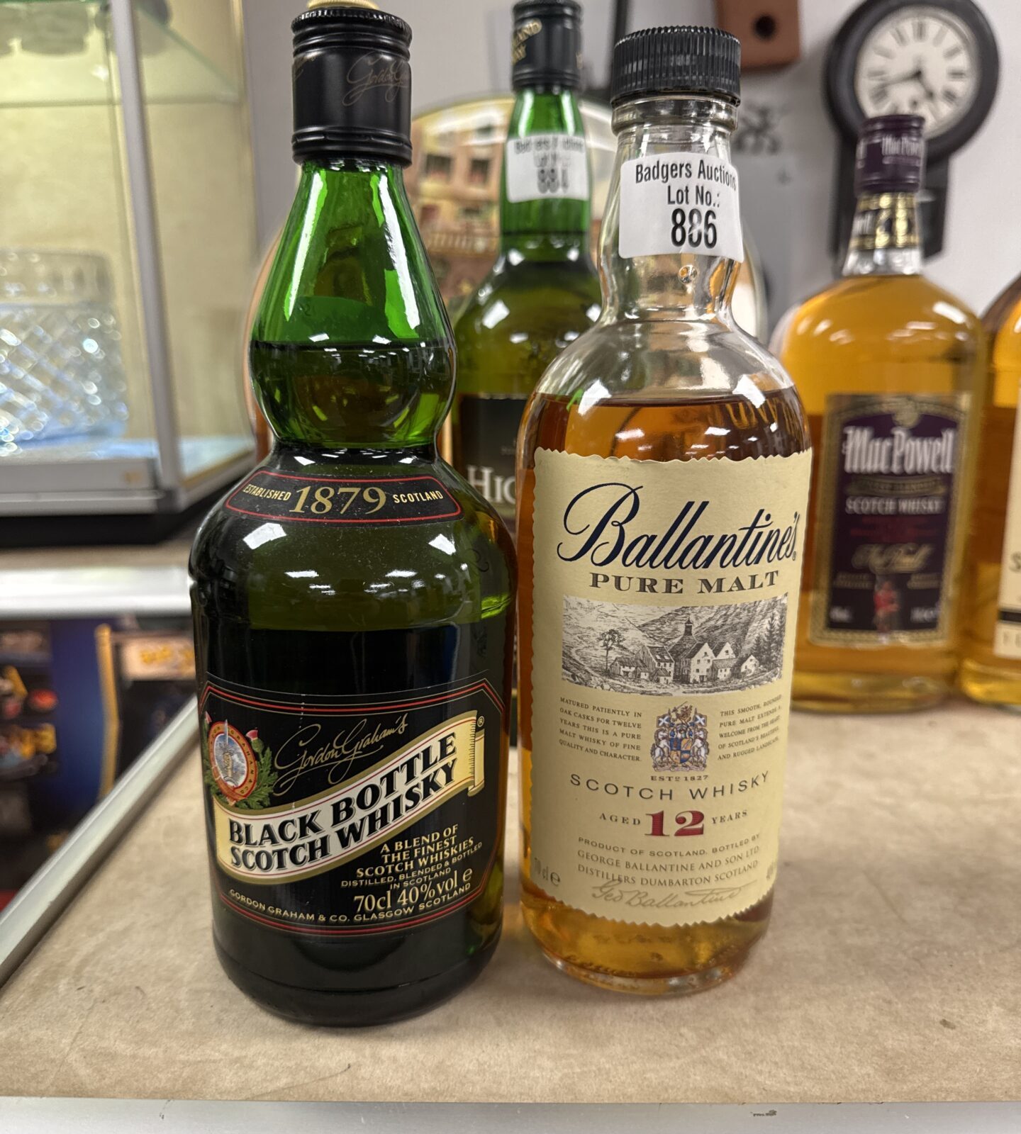 Two bottles of whisky inc Gordon grahams & ballantines