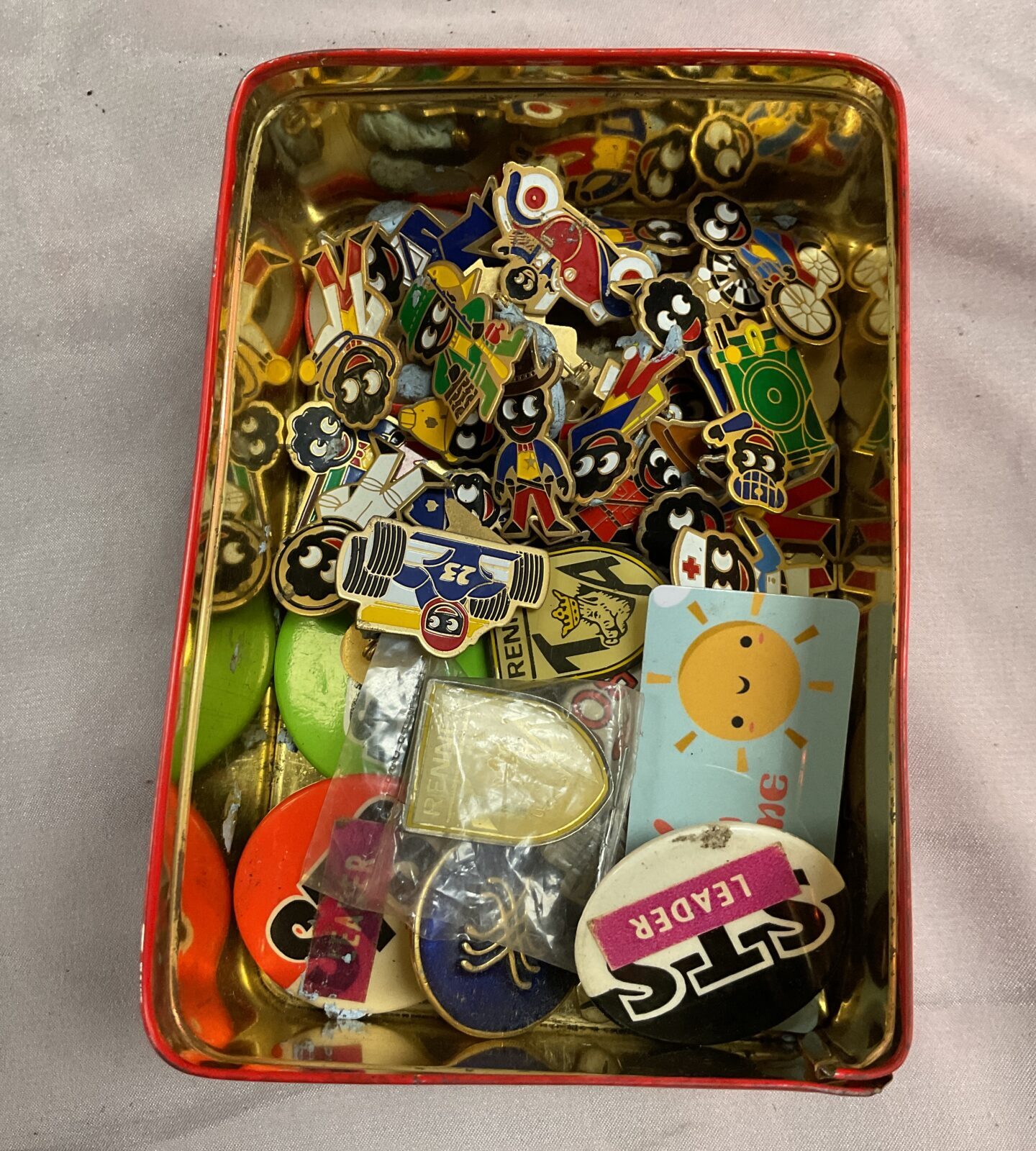 Collection of Vintage Robinson golly badge and other badges