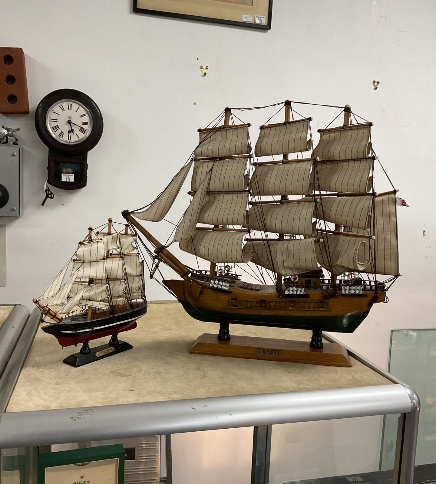 Wooden model of the HMS bounty 20” length approx and small cutty sark