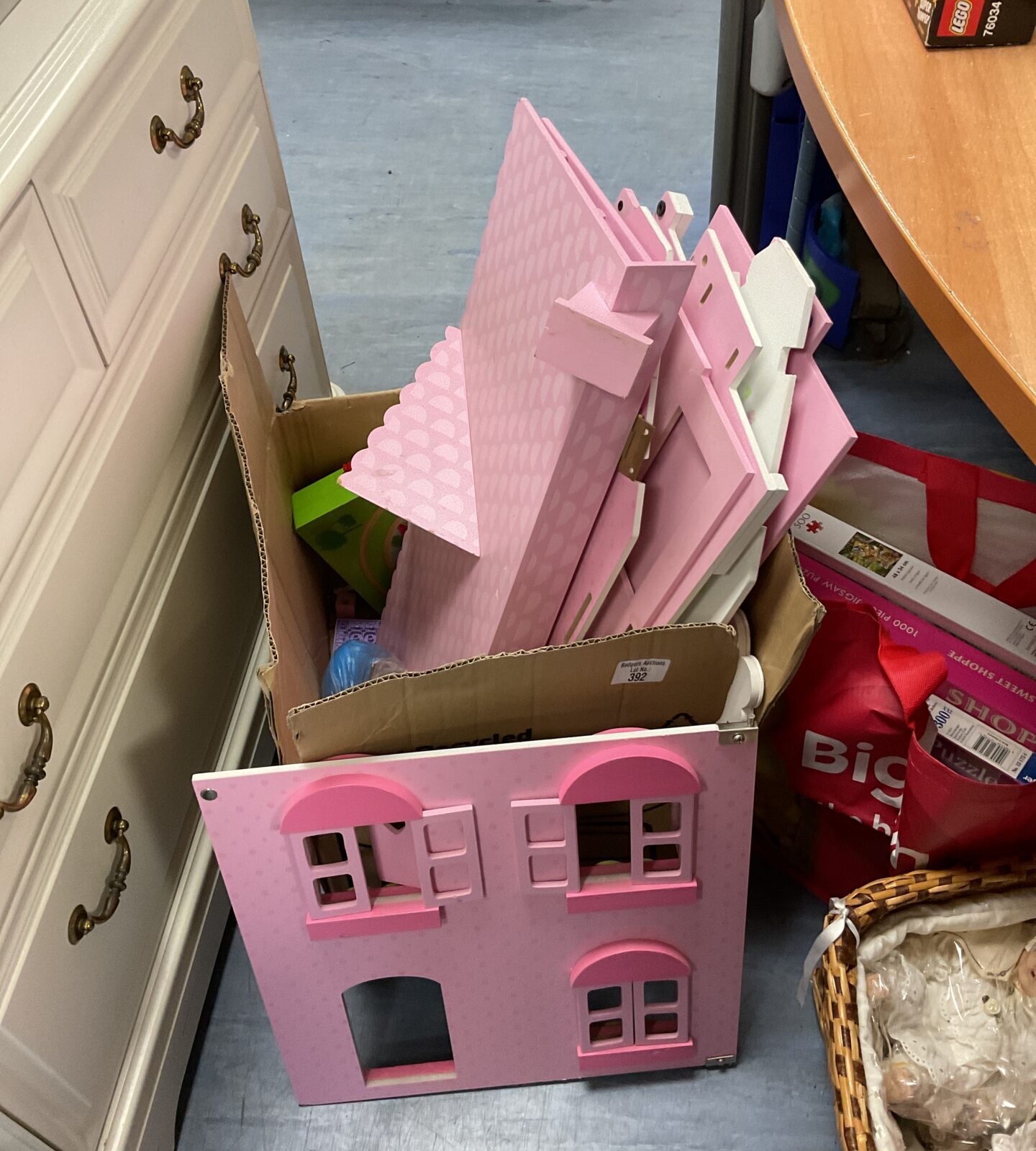 Pink wooden dolls house