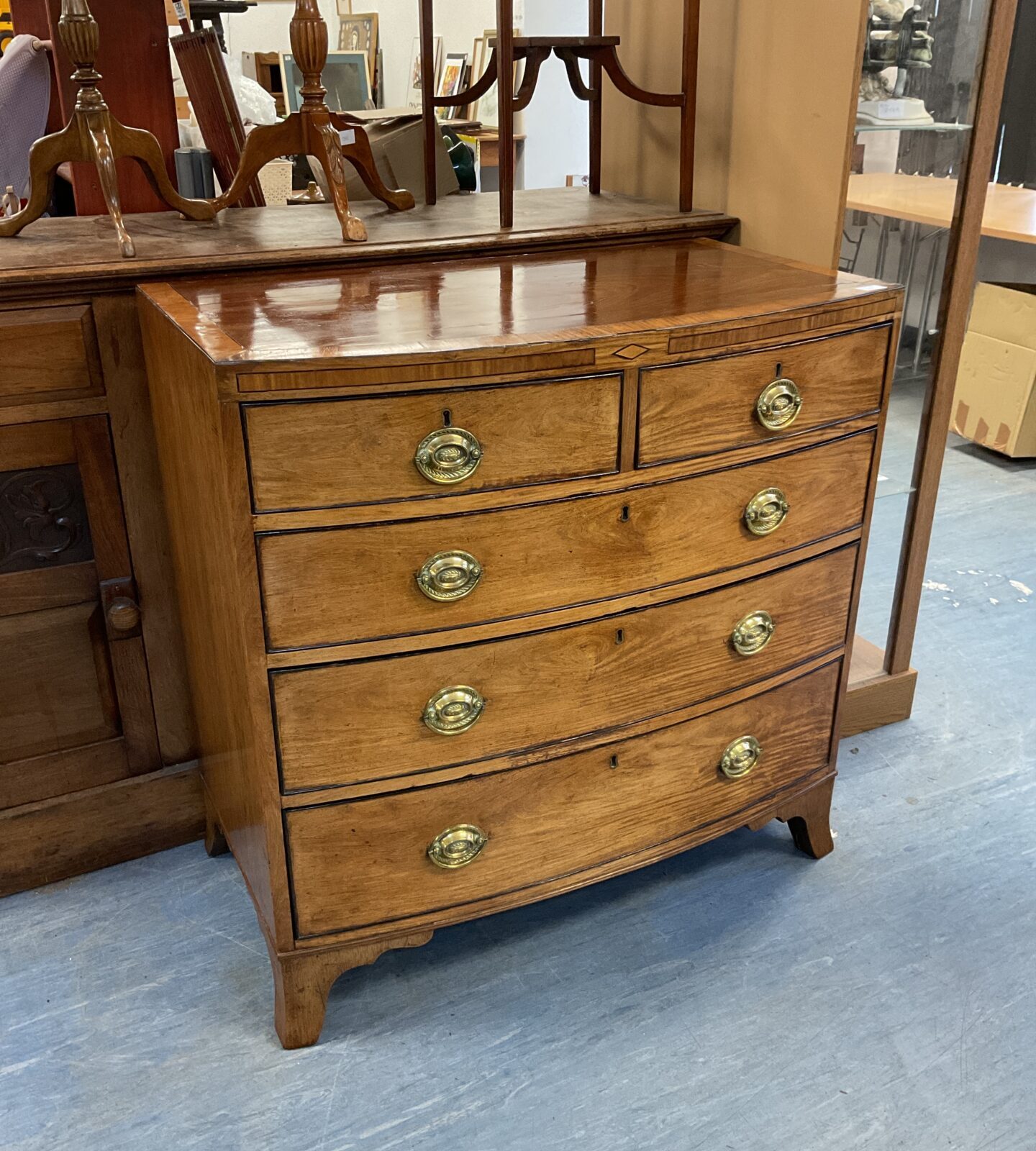 George iii regency mahogany two over three bow front chest of drawers