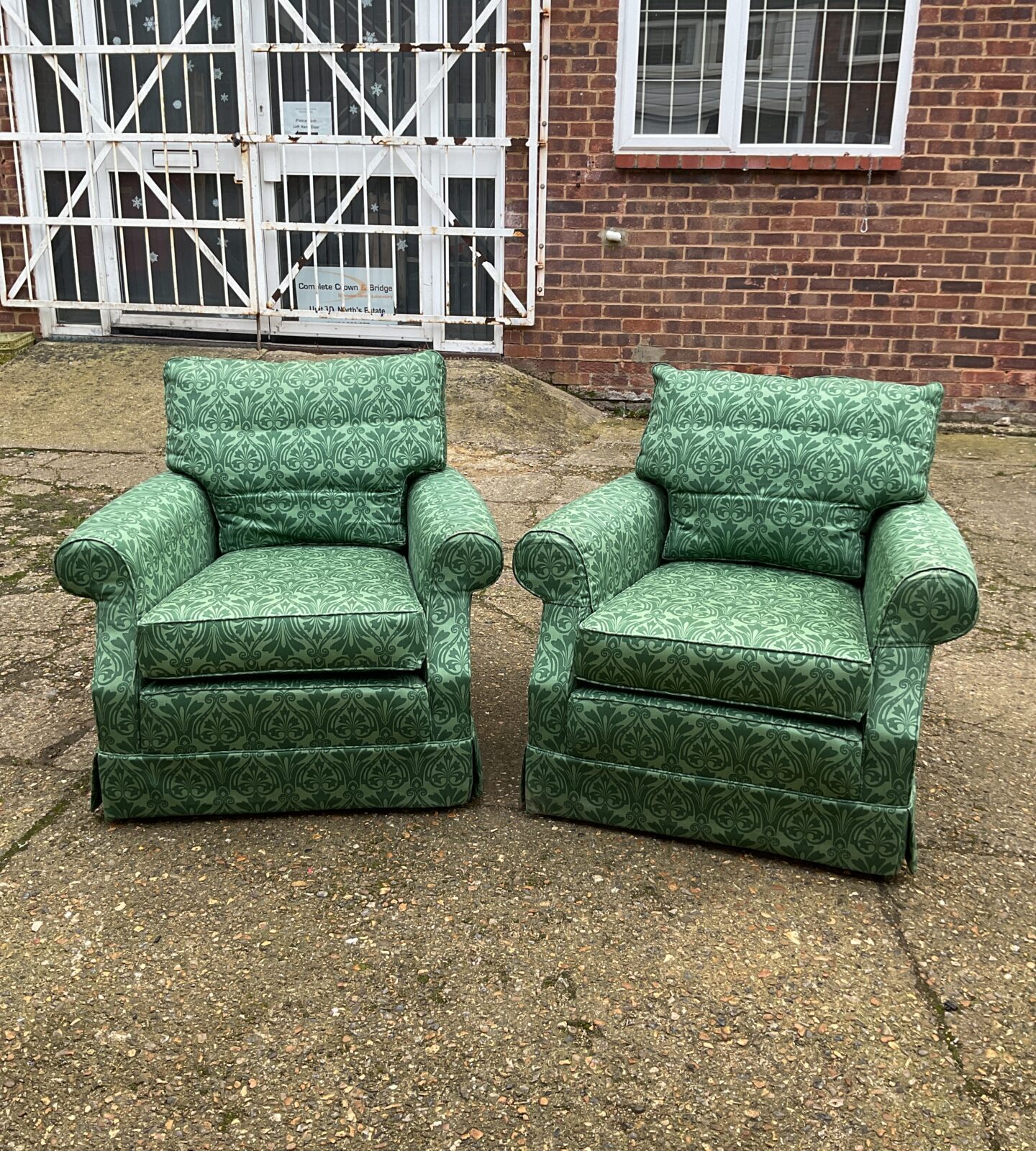 Pair of green fabric armchairs