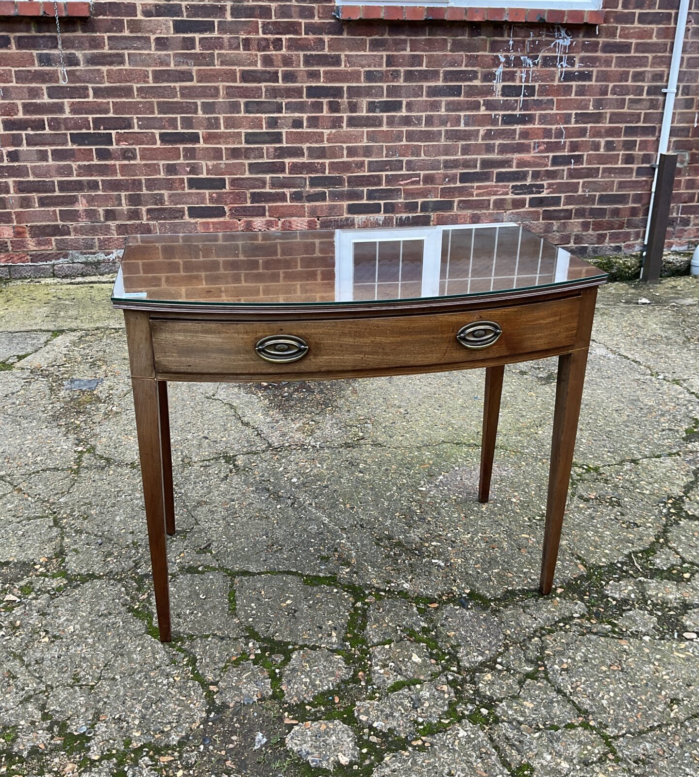 Antique bow fronted mahogany side table with drawer circa 1830