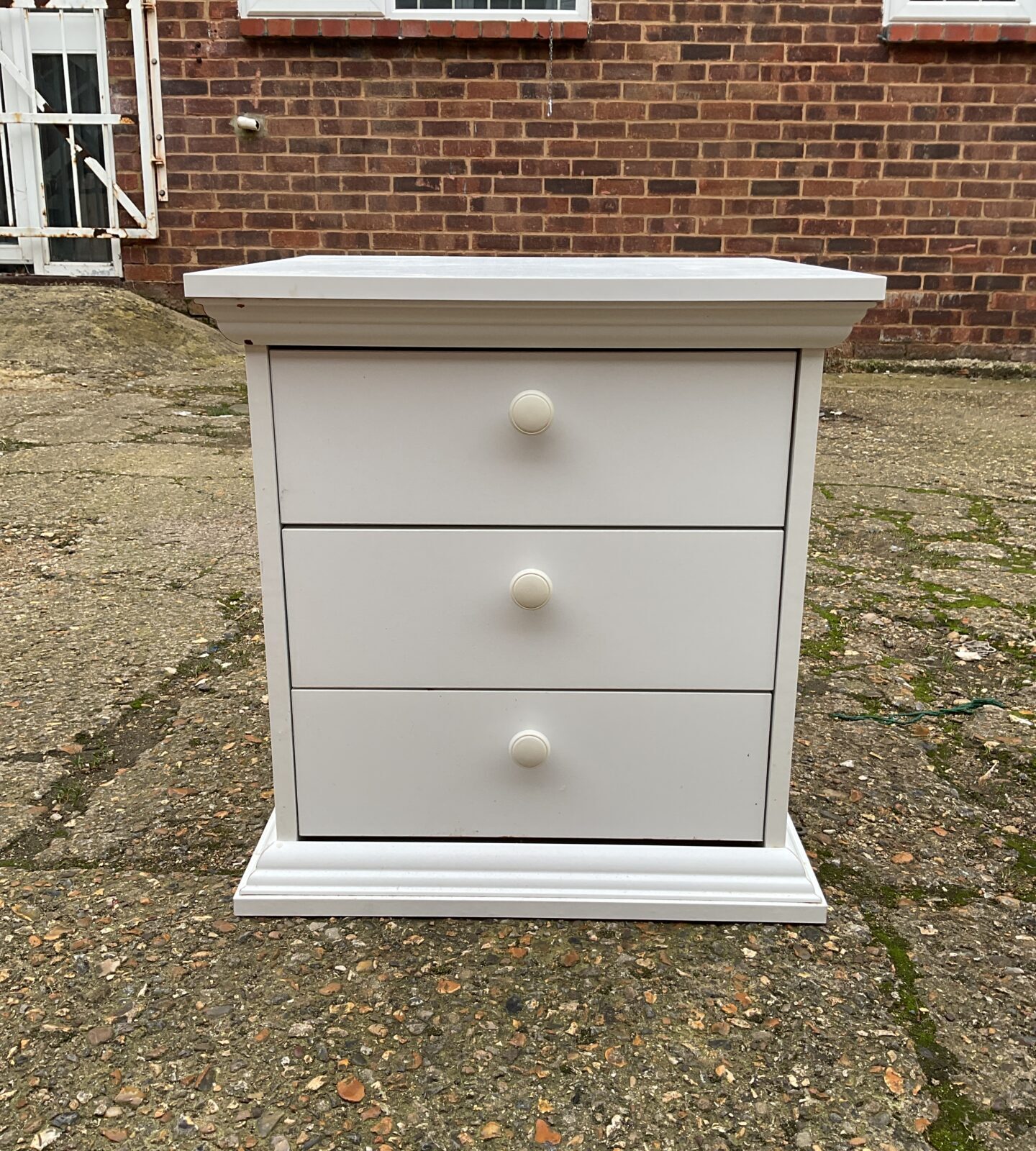 White three drawer bedside cabinet