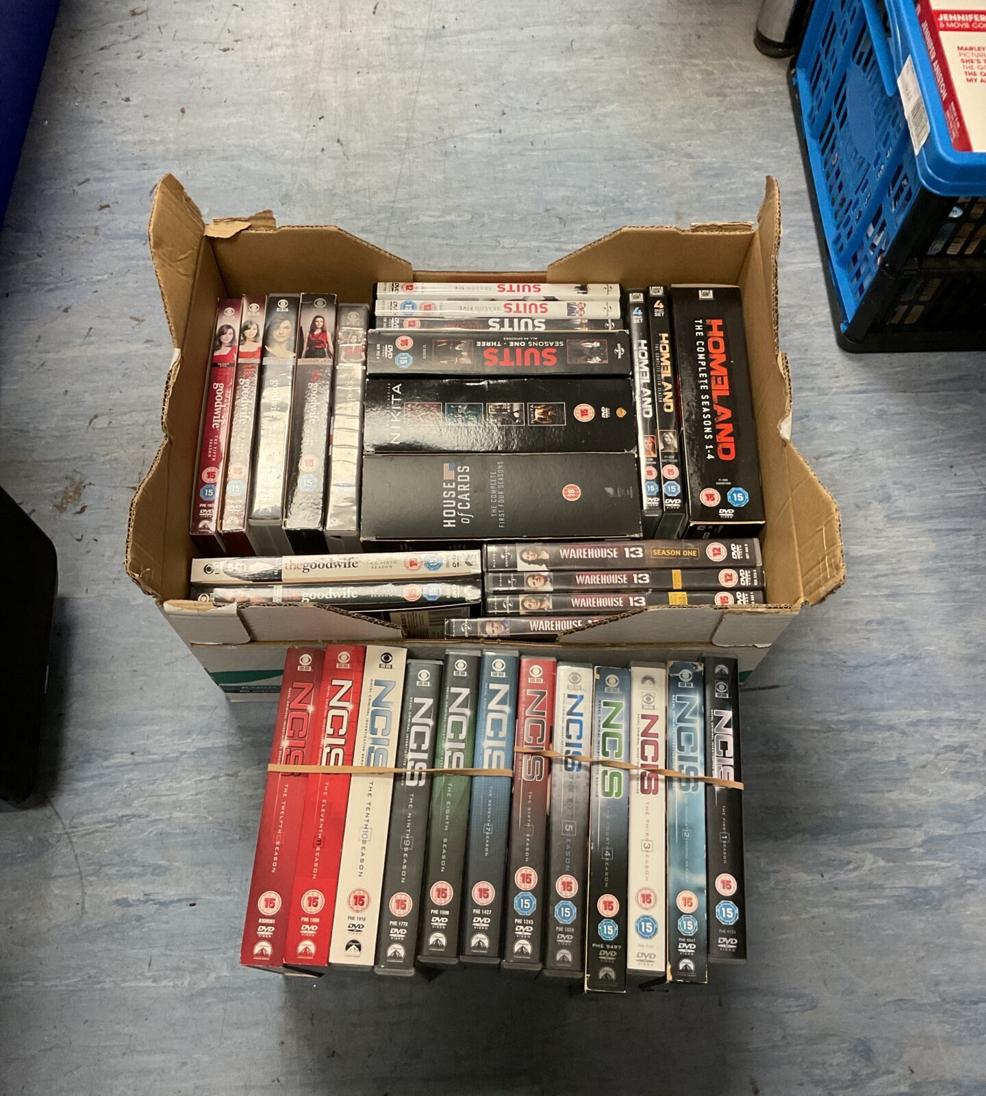 Box of dvds including ncis & house of cards