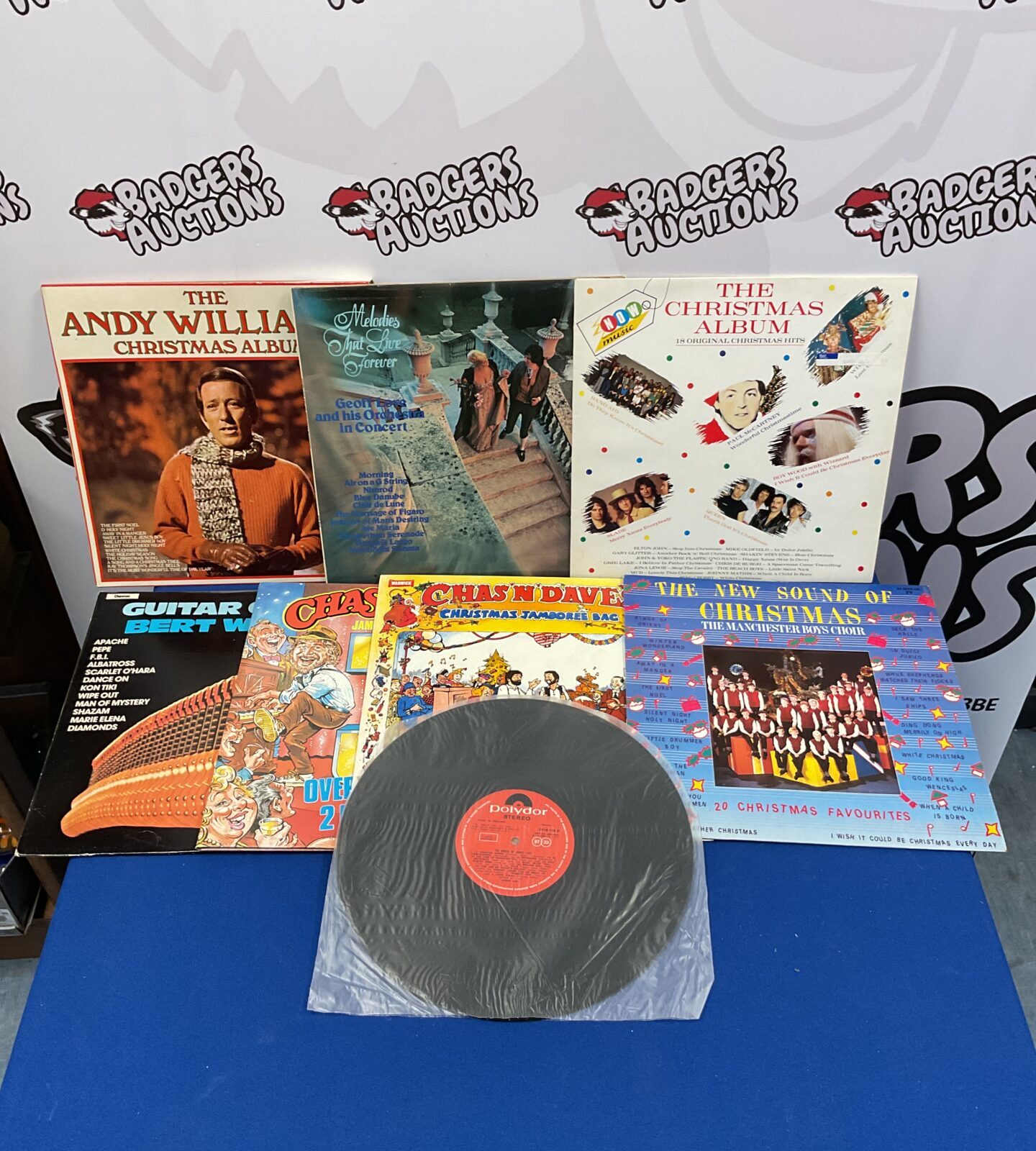 Selection of 12” vinyl Christmas records including now