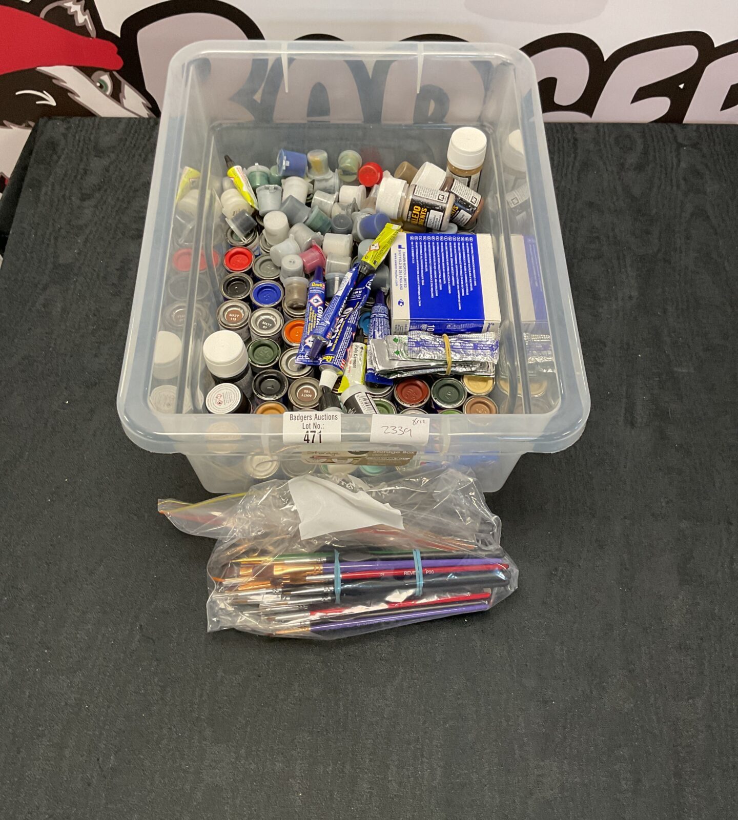 Box of mixed inc paints, brushes and poly cements