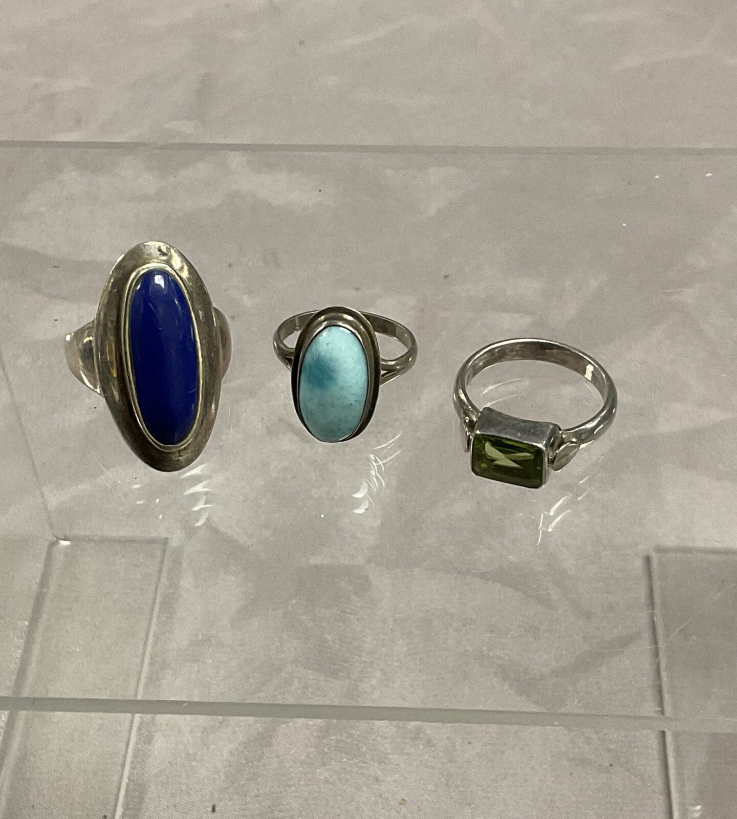 Three 925 Silver stone set rings sizes N P R