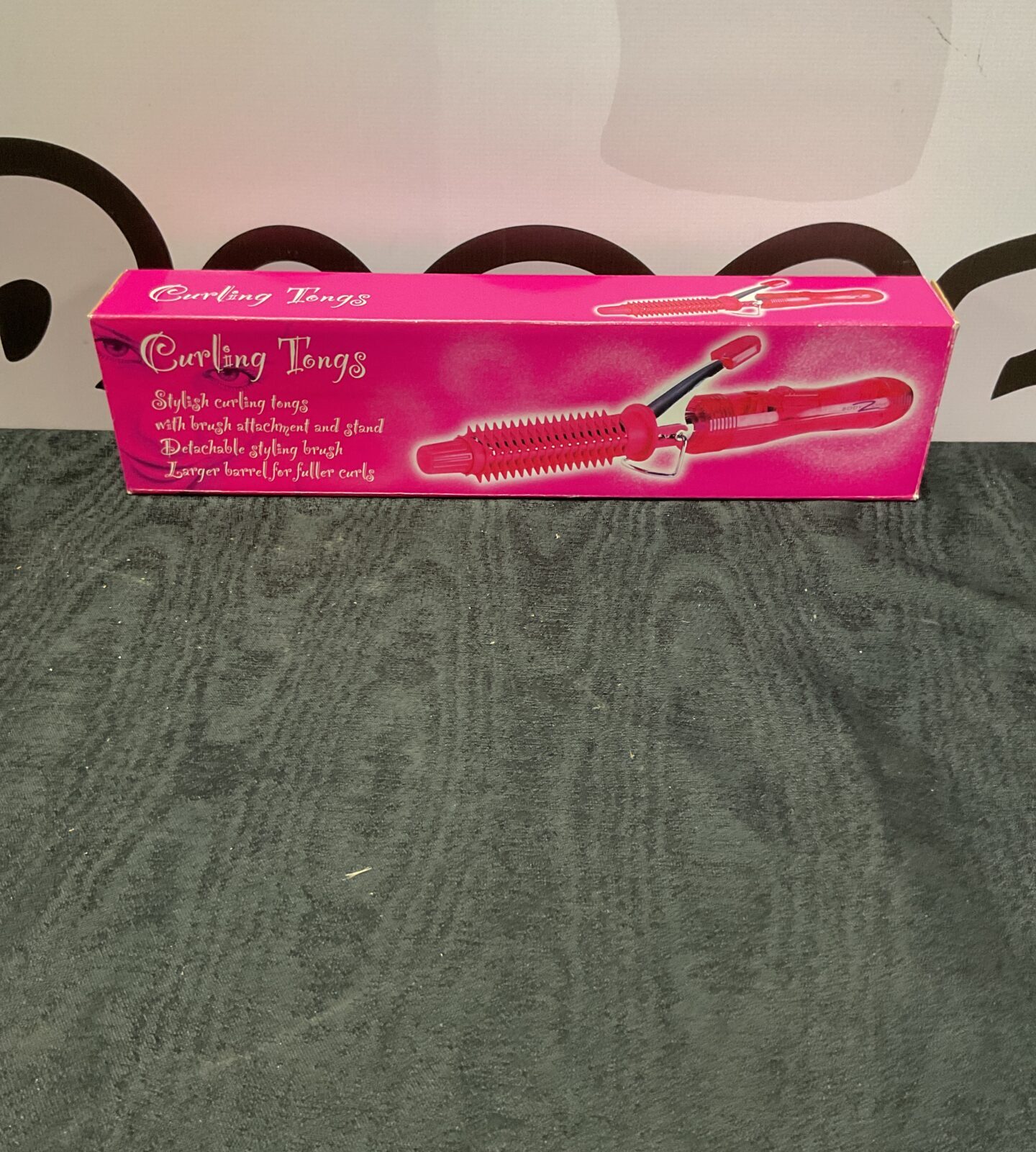 Set of pink curling tongs