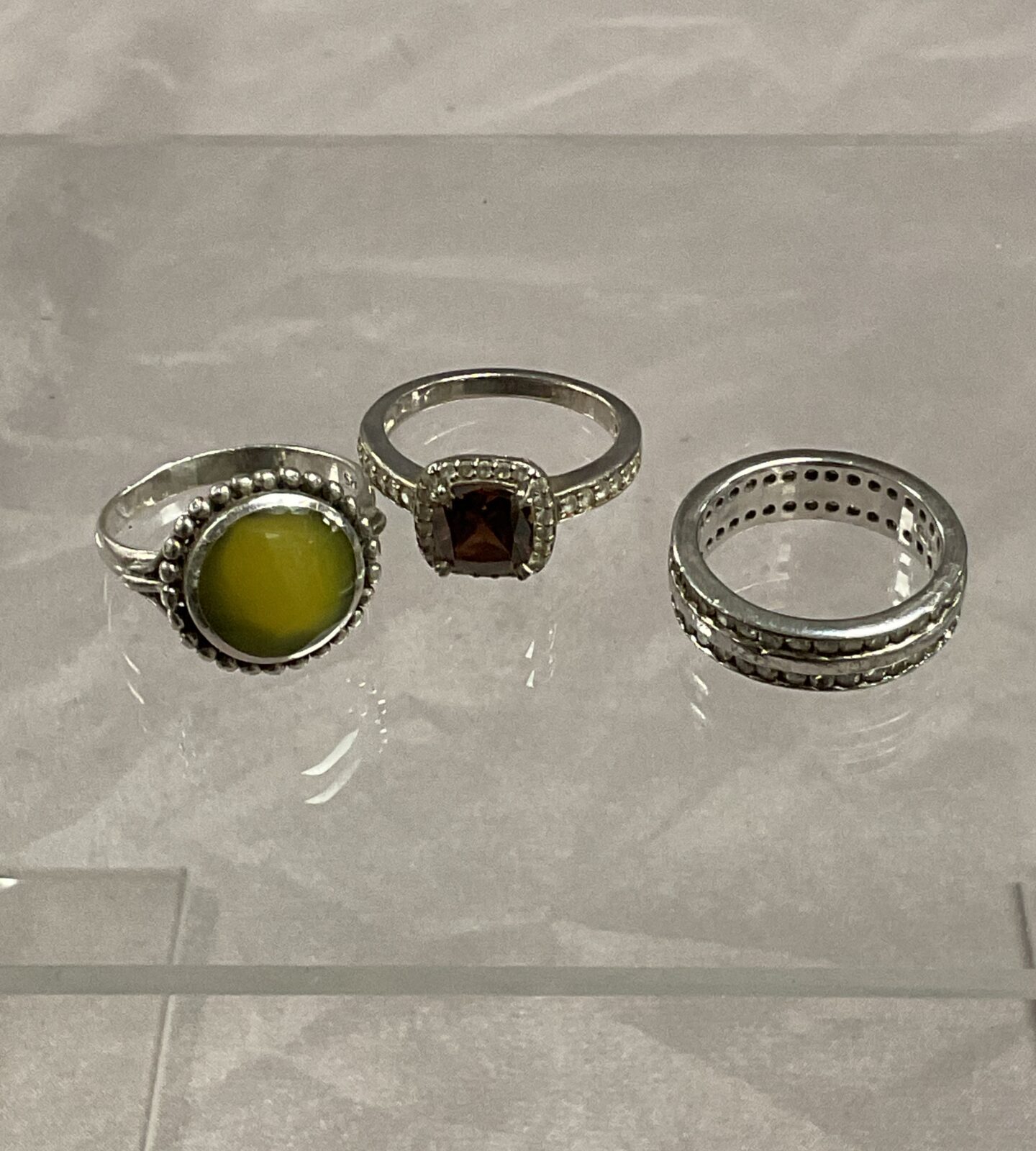 Three 925 Silver stone set rings sizes O P R