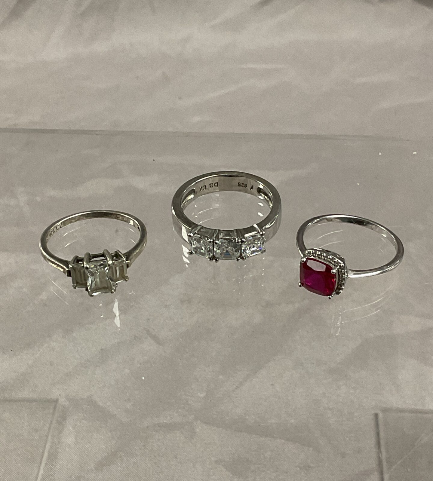 Three 925 Silver stone set rings sizes P