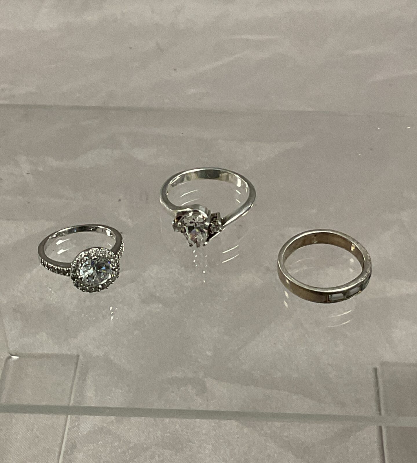 Three 925 Silver stone set rings sizes K N S