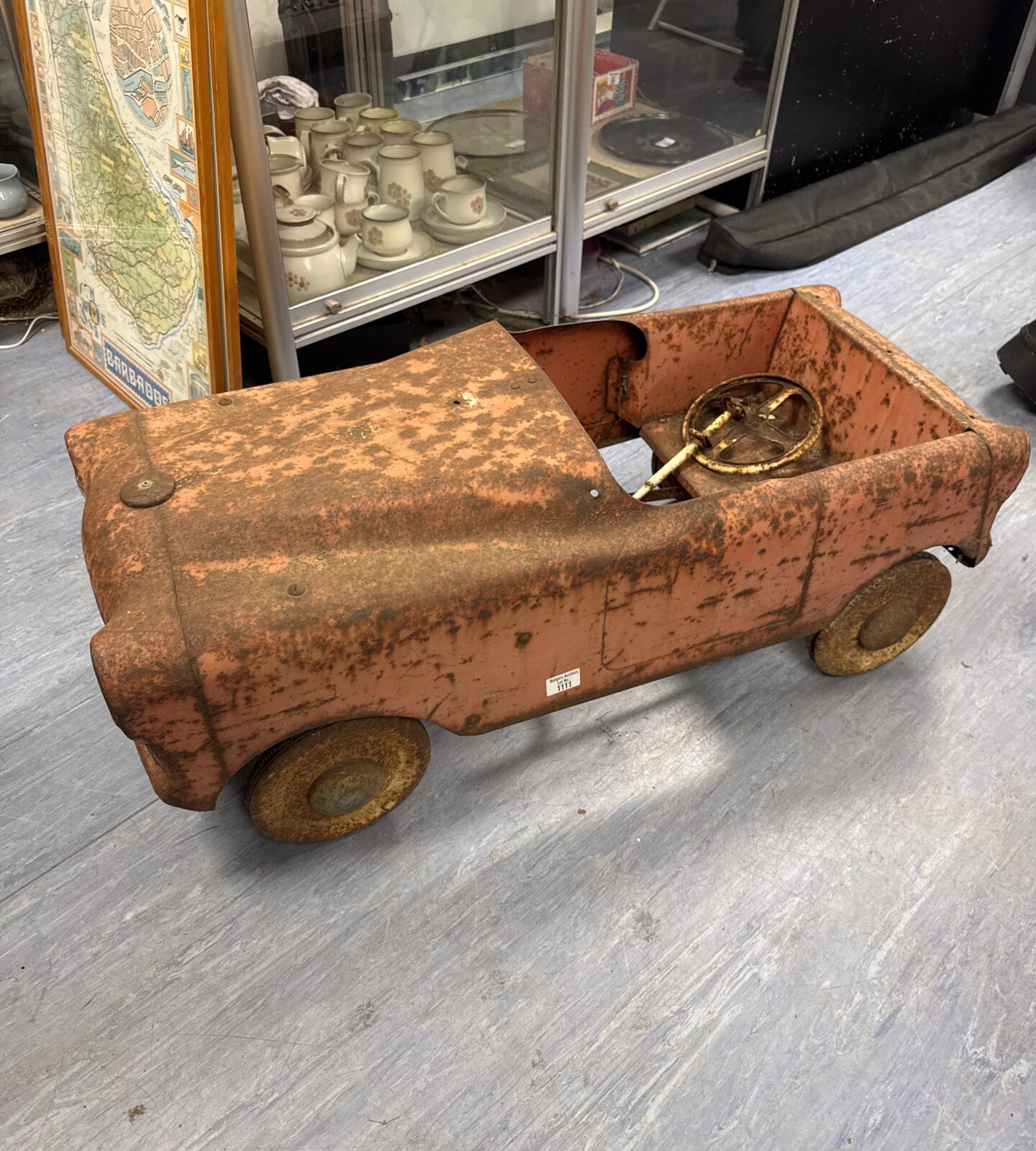 Antique child’s pedal car for restoration