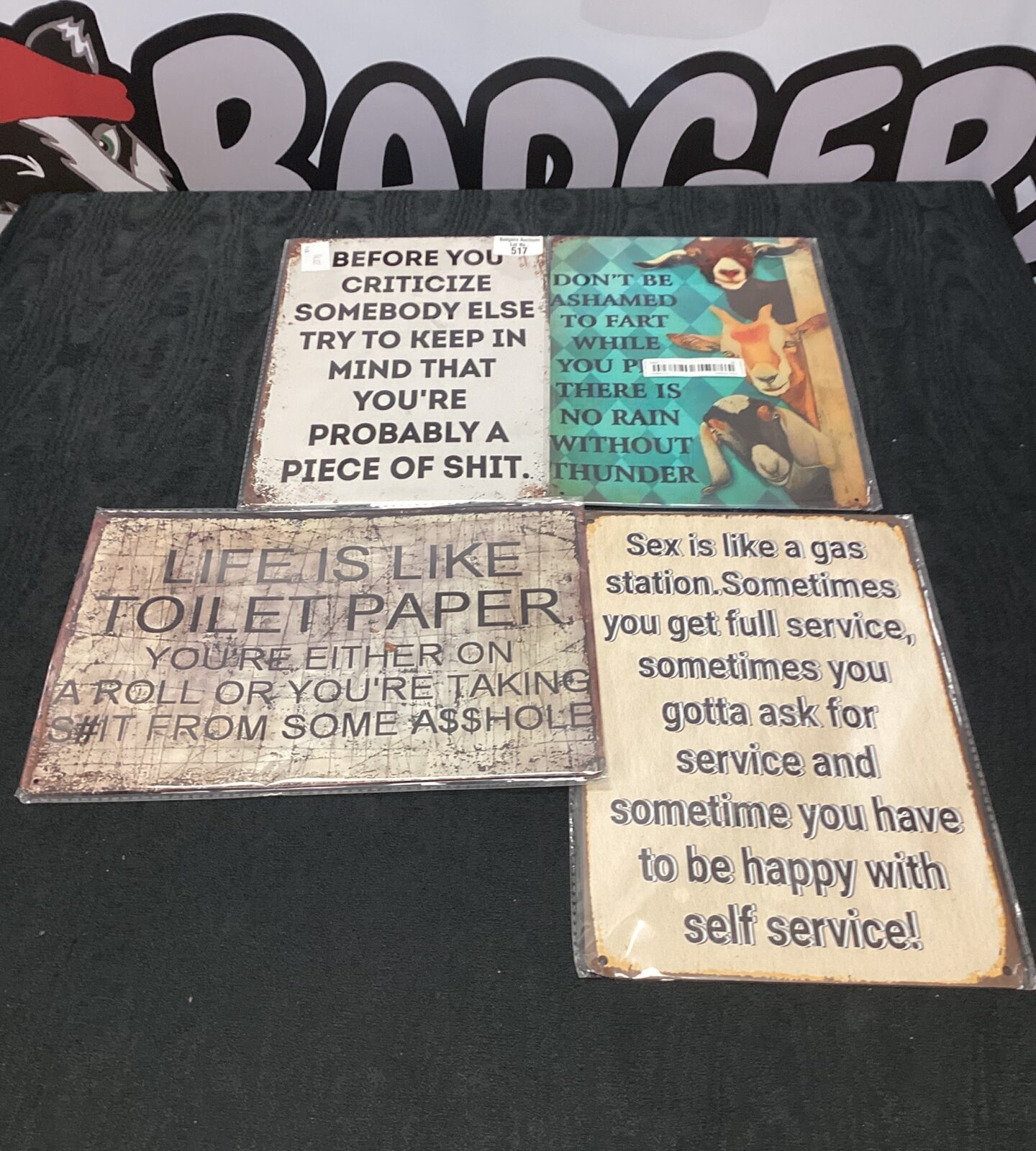 Four tin funny quotation signs